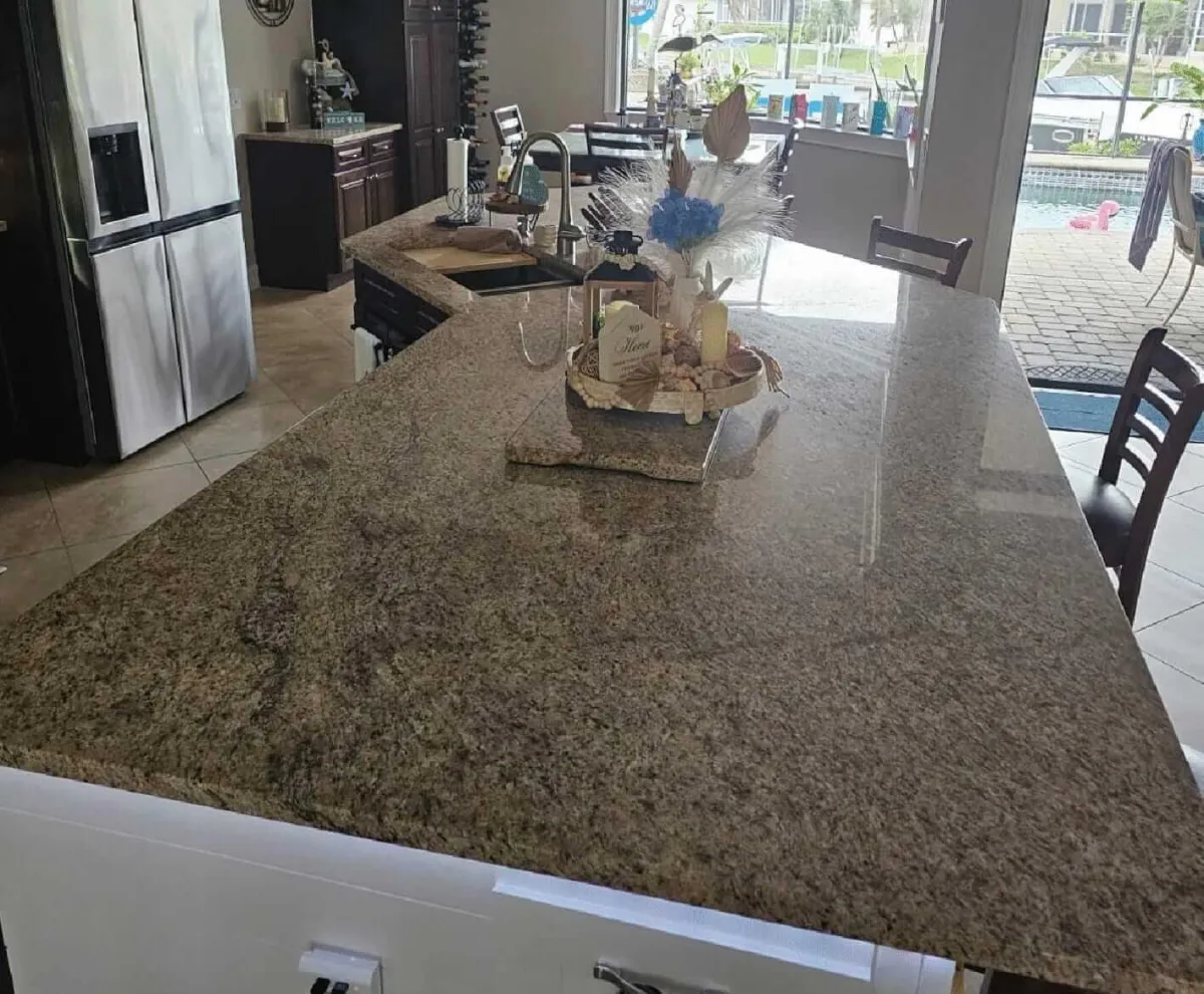 yellow Caterpillar excavator digging up dirt