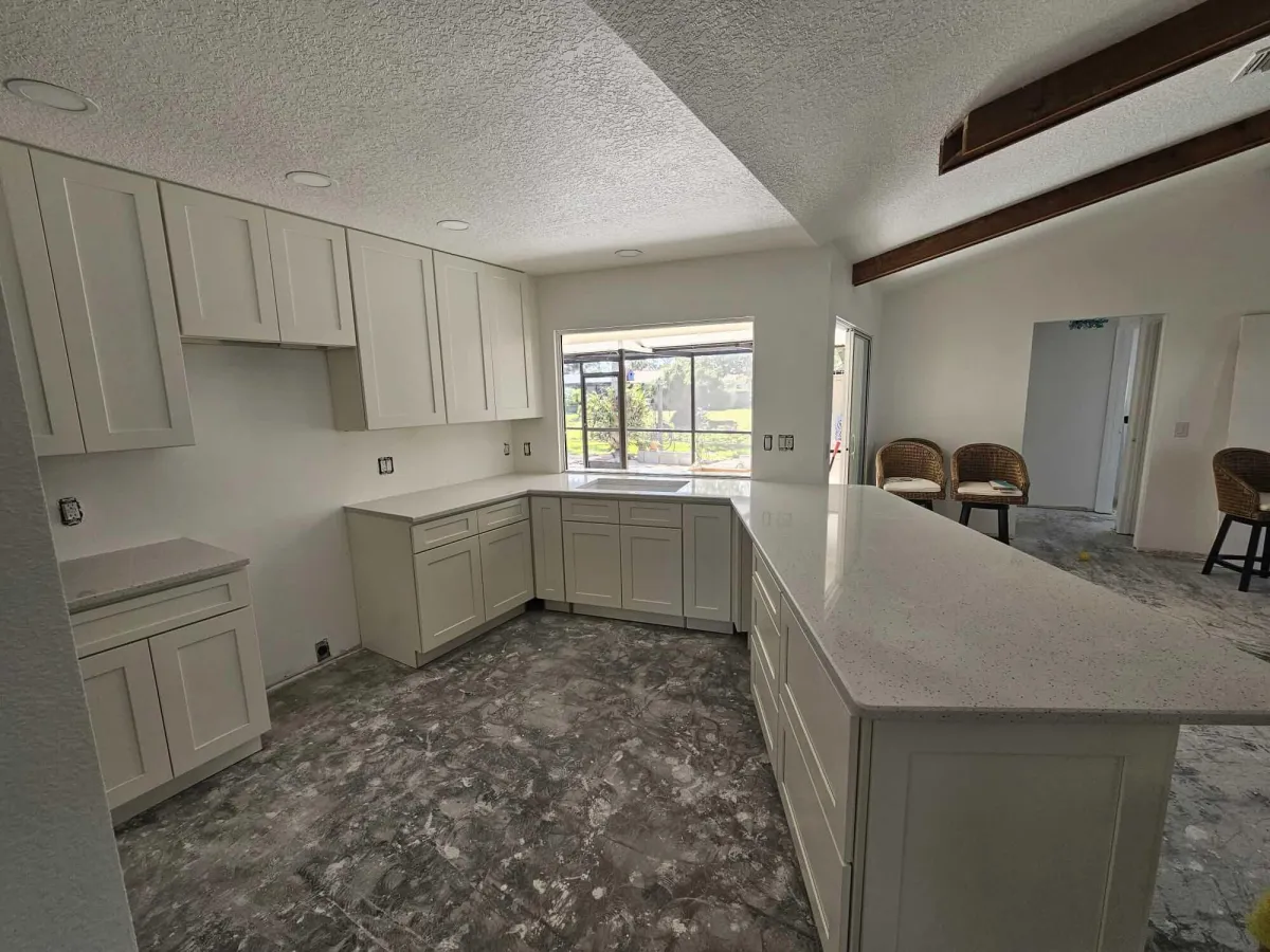 person standing beside 31 painted gray concrete road at daytime