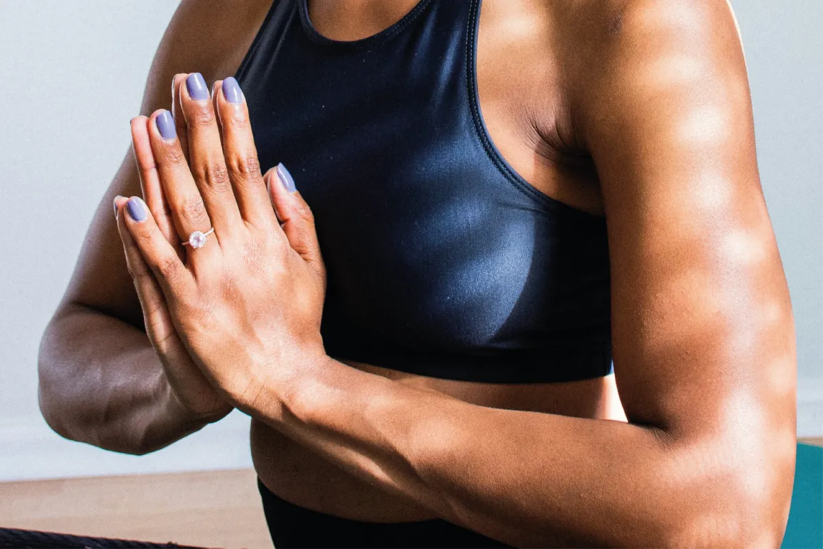 Image of hands joined in prayer, symbolizing spiritual intimacy and soulful connection in a transformative relationship paradigm.