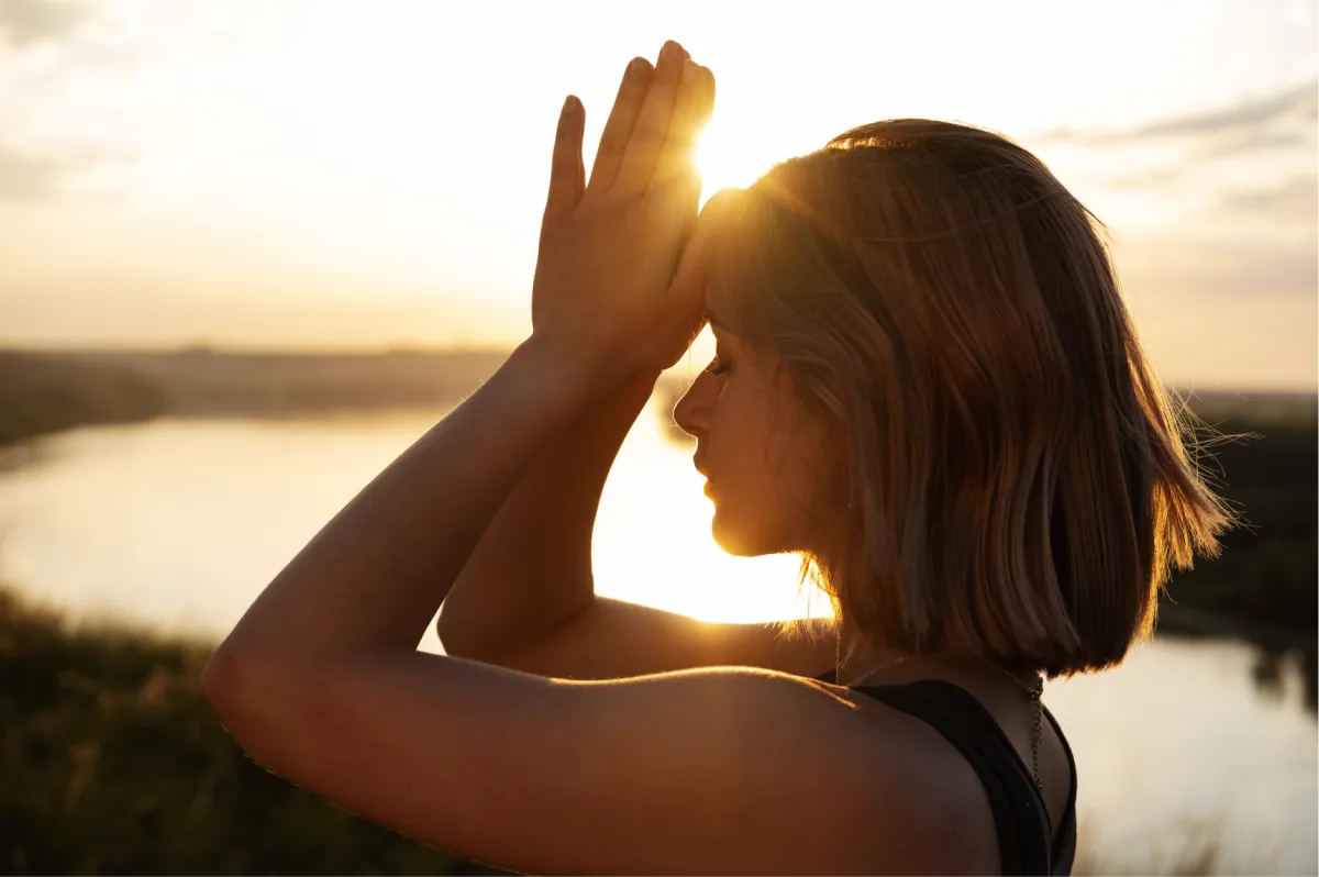 "Person experiencing emotional healing through Breathwork, releasing negative thoughts like anger, guilt, and fear, promoting inner peace and personal growth."