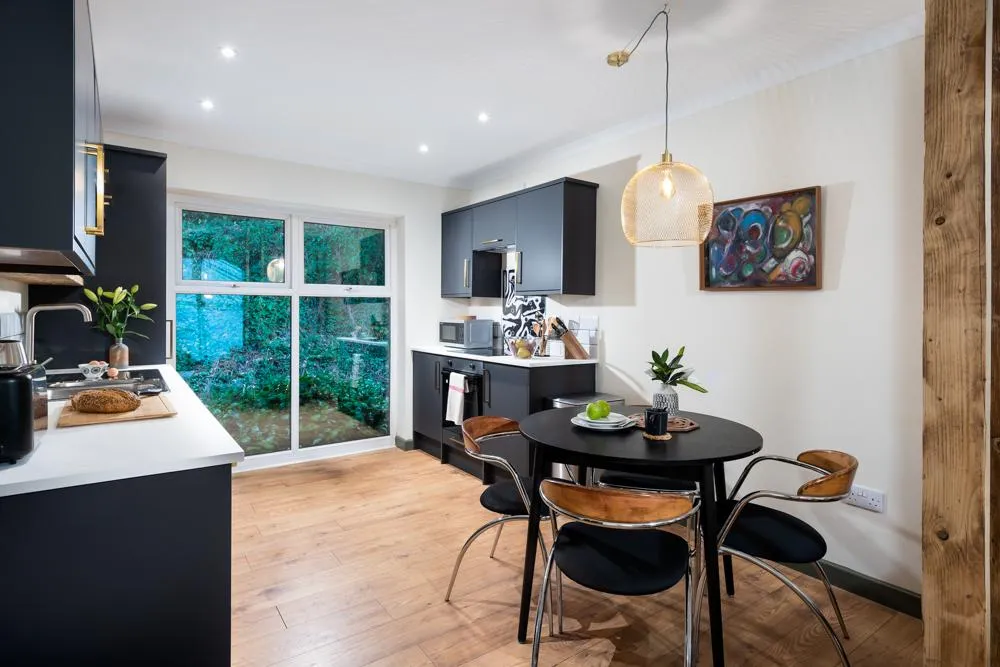 A beautiful kitchen diner in this Truro 2 bed apartment.