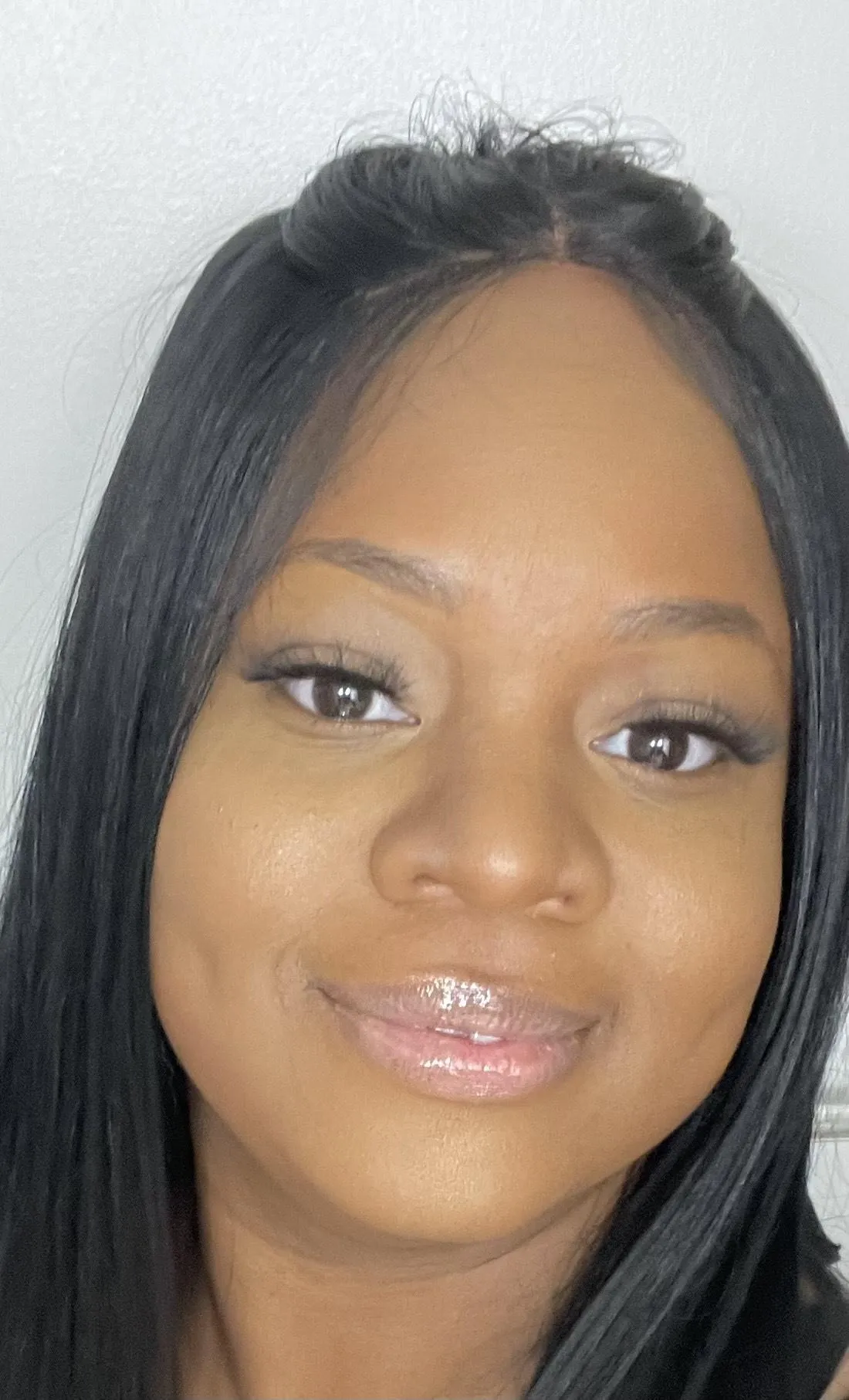 Black woman stylist with glasses, arranging tools, salon background, 1:1 aspect ratio