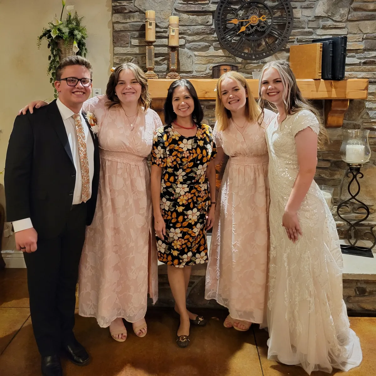 Happy family of Jessica Howard, whose four children were taught by Mrs. Odulio.