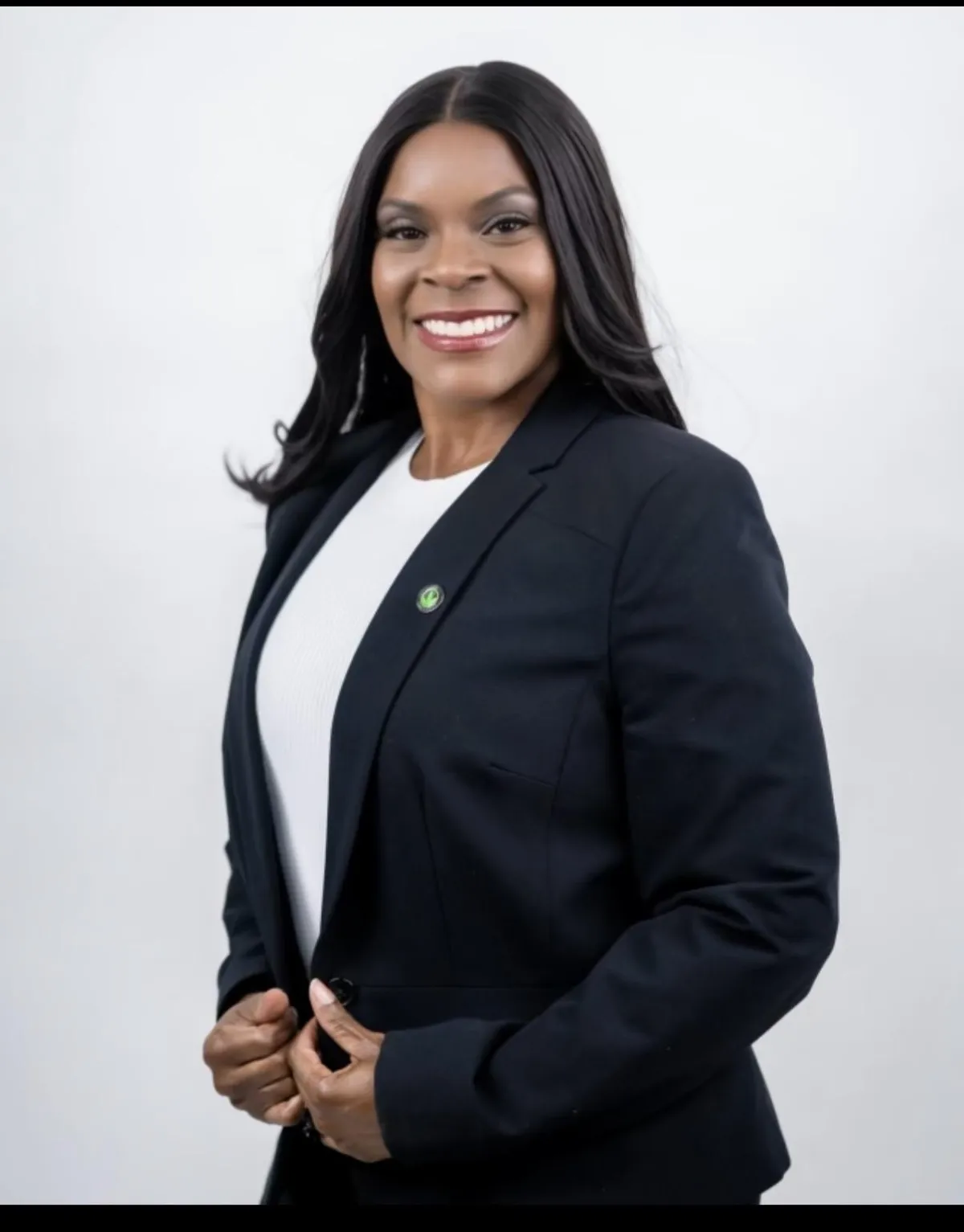 Michelle Williams smiling and leading a session