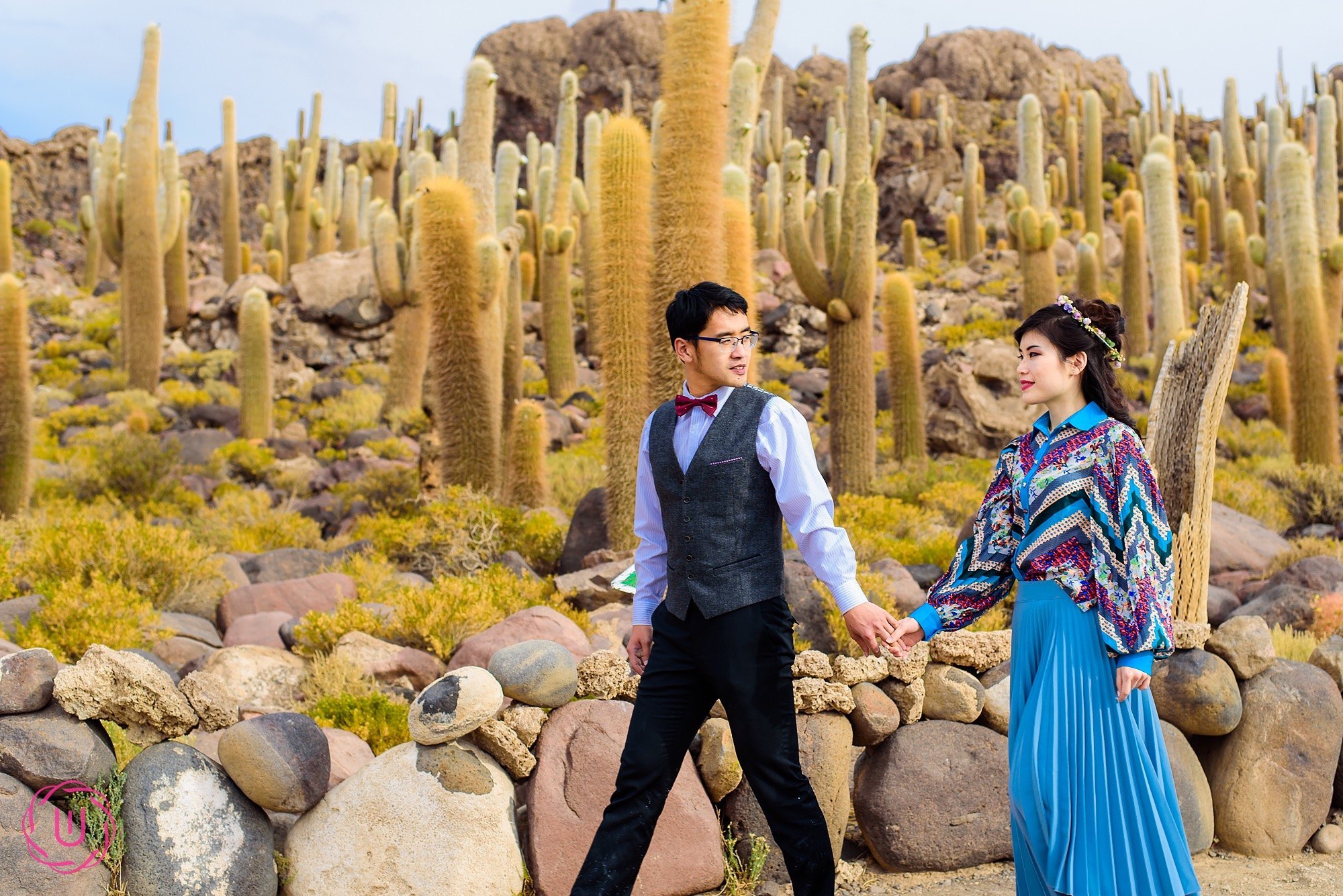 silhouette of island with calm sea during sunset