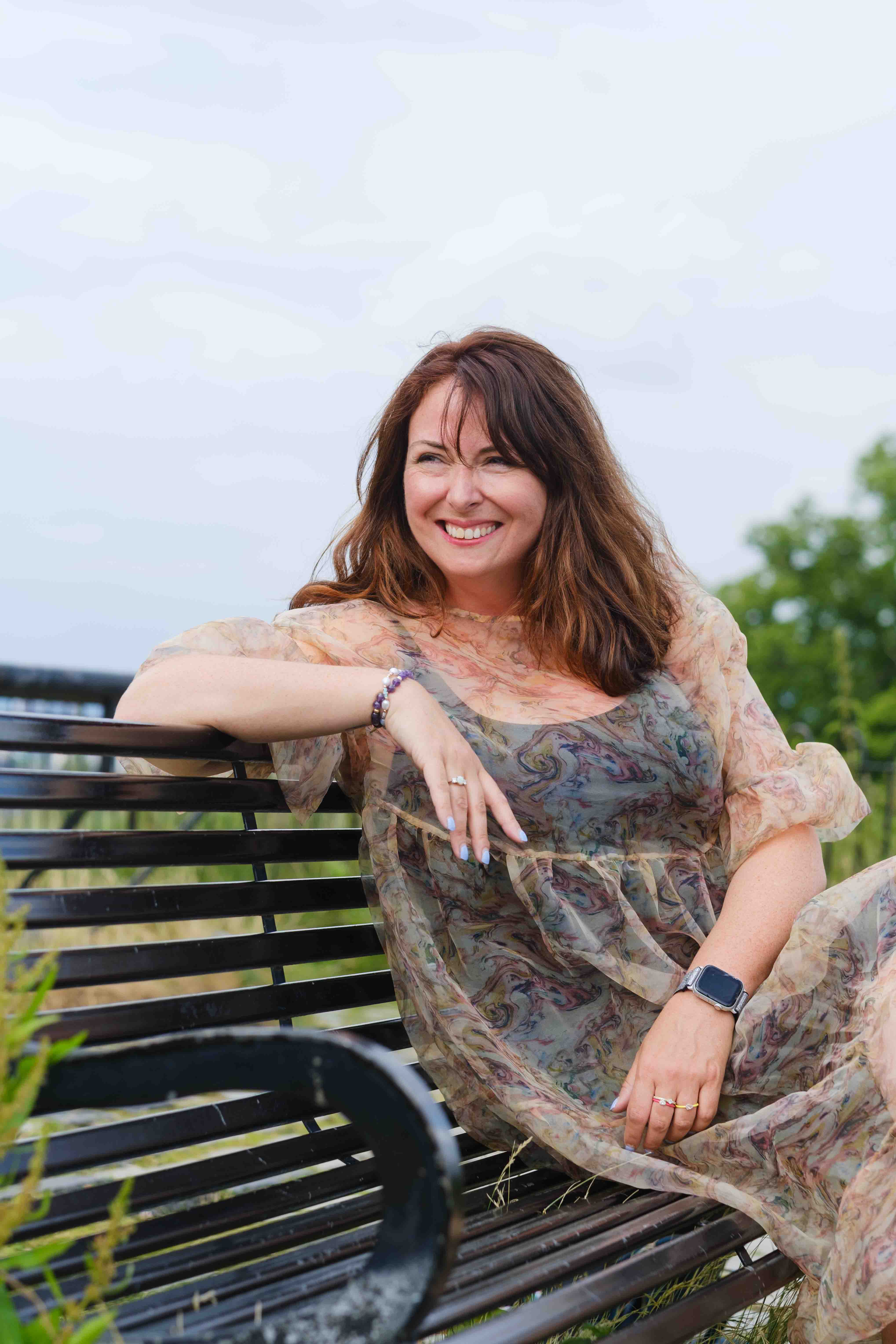 Outdoor portrait of a female writer, Claire Duffy, photographed in a Glasgow park for editorial and author branding imagery by Victoria Rose Photography