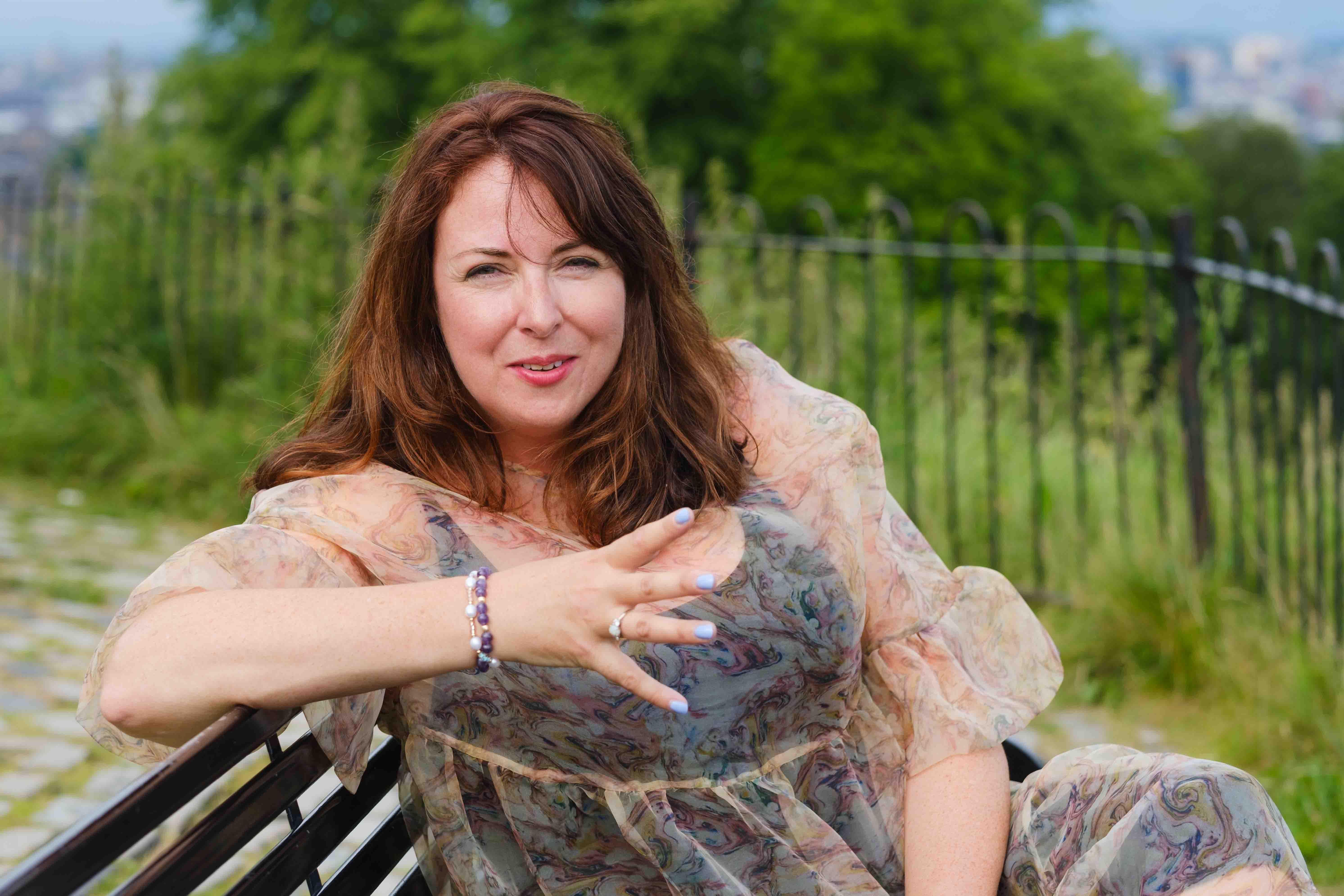 Outdoor portrait of a female writer, Claire Duffy, photographed in a Glasgow park for editorial and author branding imagery by Victoria Rose Photography