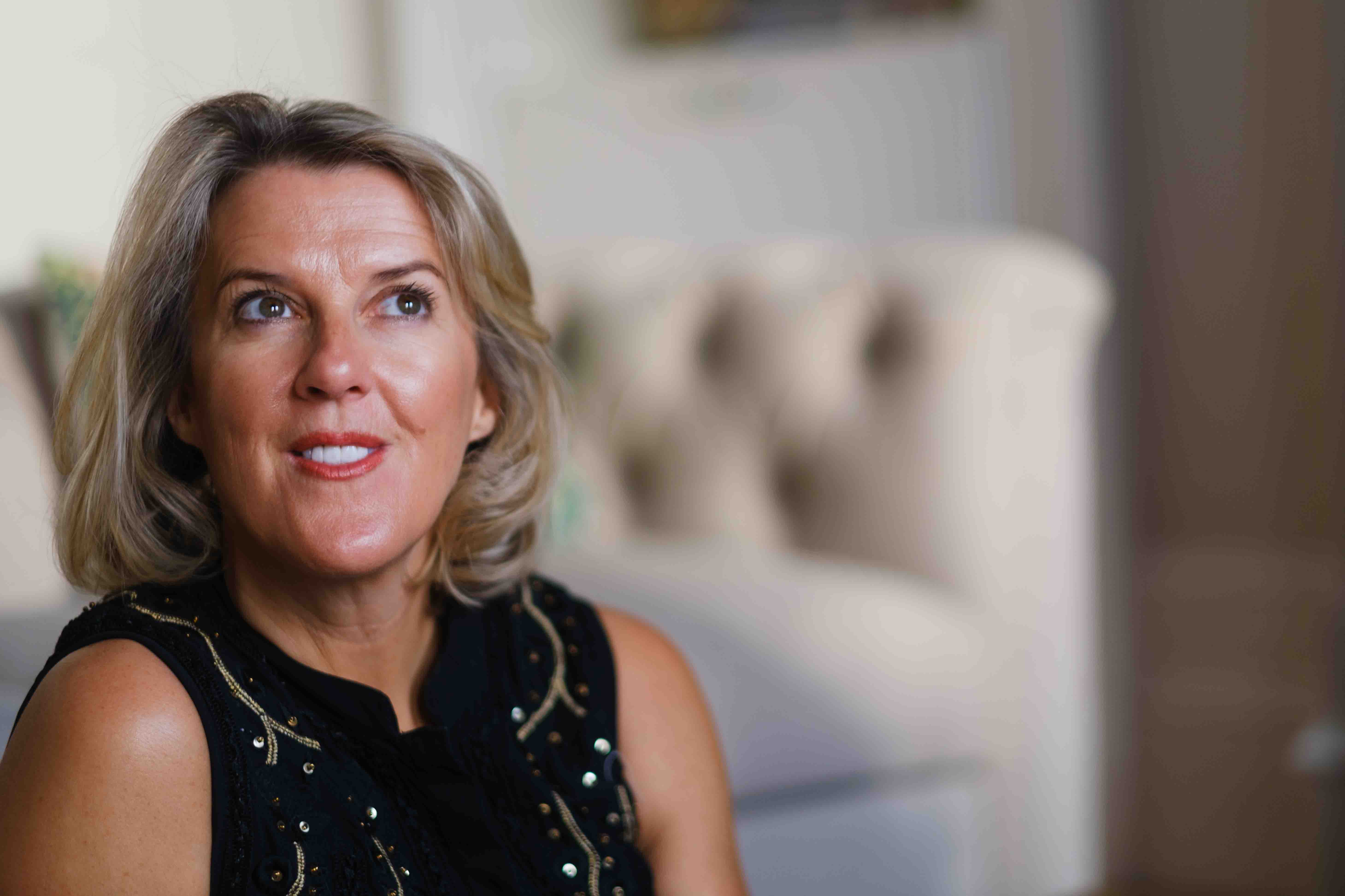 Portrait of a female coach photographed in Glasgow for professional branding and website imagery by Victoria Rose Photography