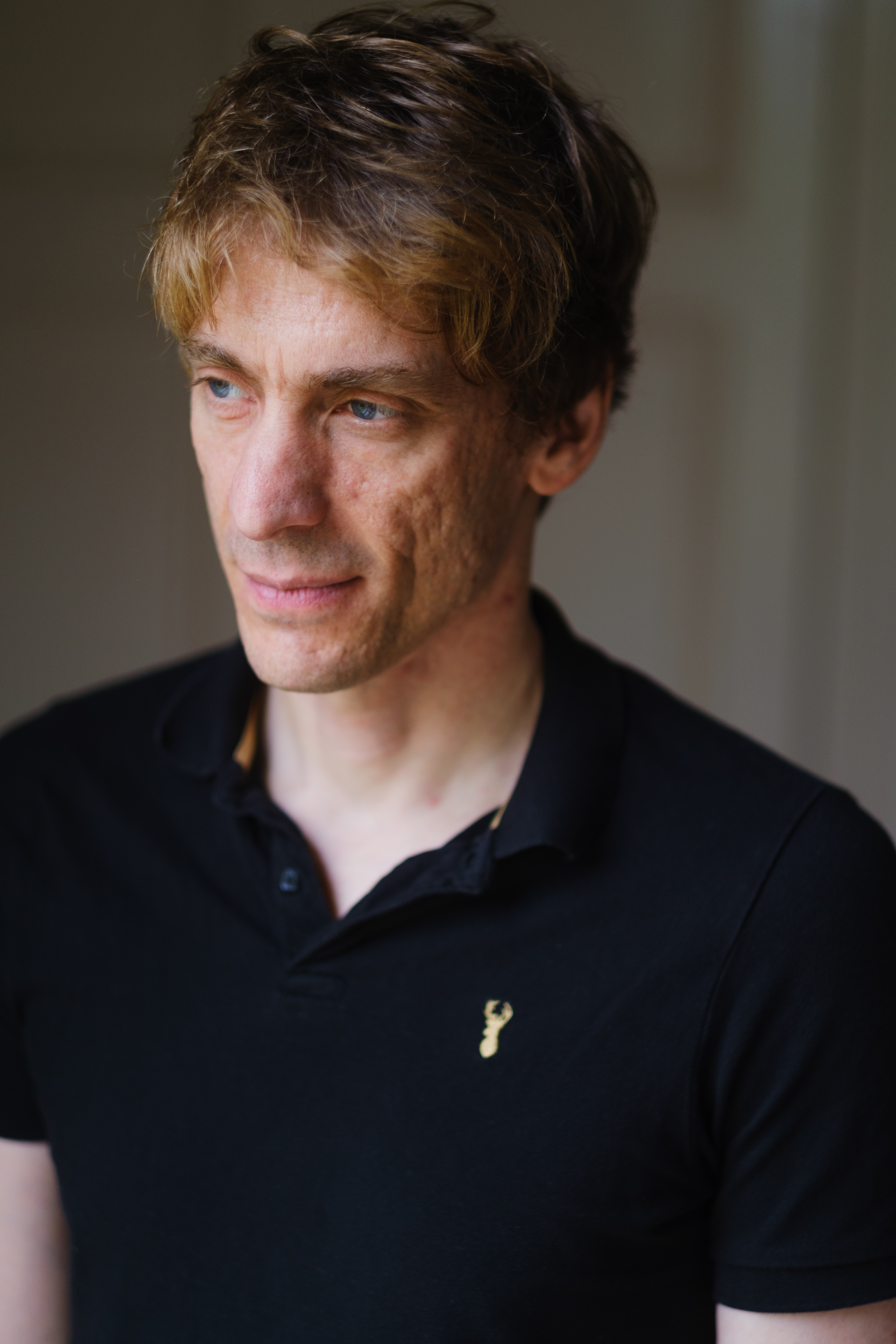 Portrait of photographer and author Sean Tucker photographed indoors in Glasgow after a live talk by Victoria Rose Photography