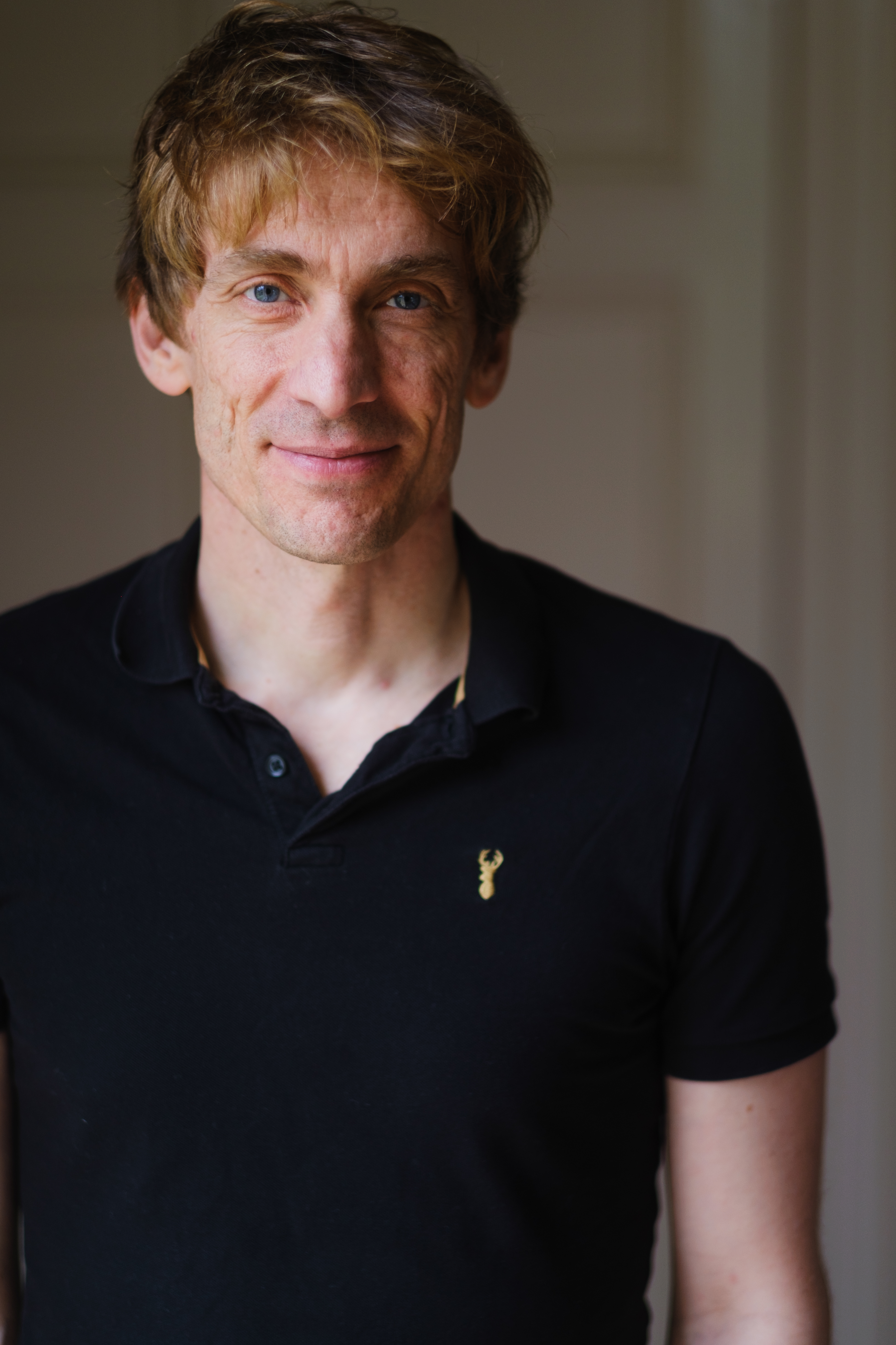Portrait of photographer and author Sean Tucker photographed indoors in Glasgow after a live talk by Victoria Rose Photography