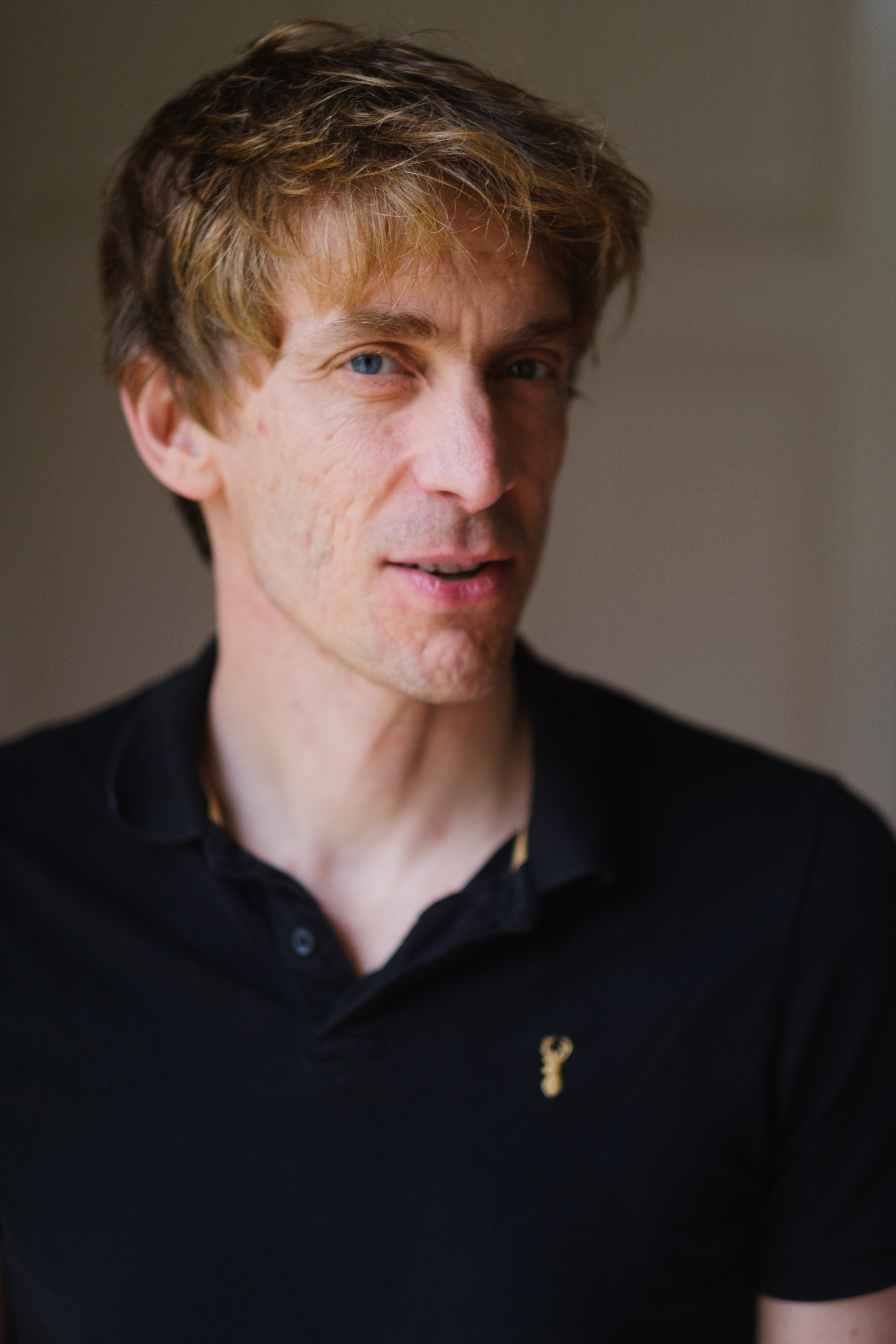 Portrait of photographer and author Sean Tucker photographed indoors in Glasgow after a live talk by Victoria Rose Photography