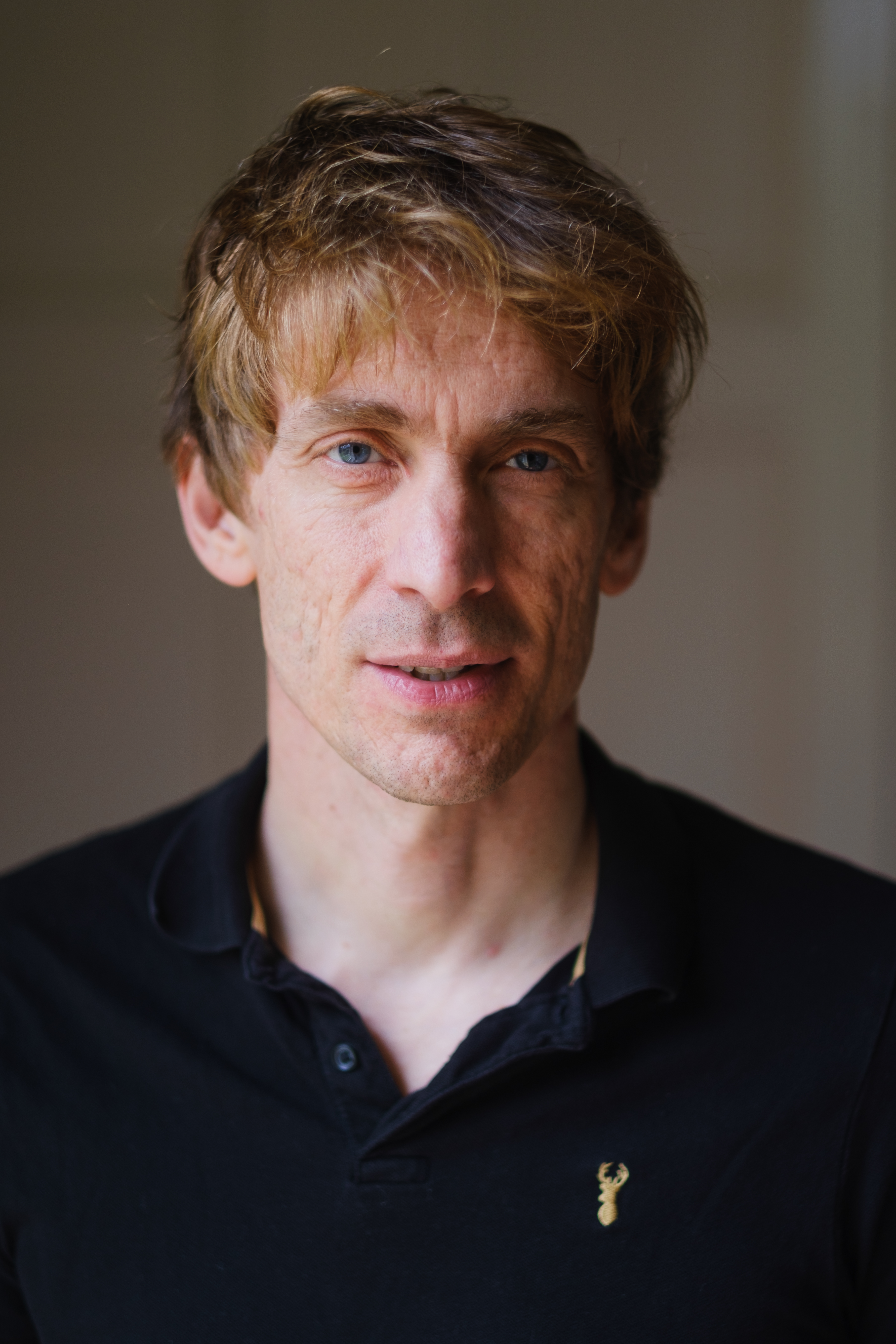 Portrait of photographer and author Sean Tucker photographed indoors in Glasgow after a live talk by Victoria Rose Photography