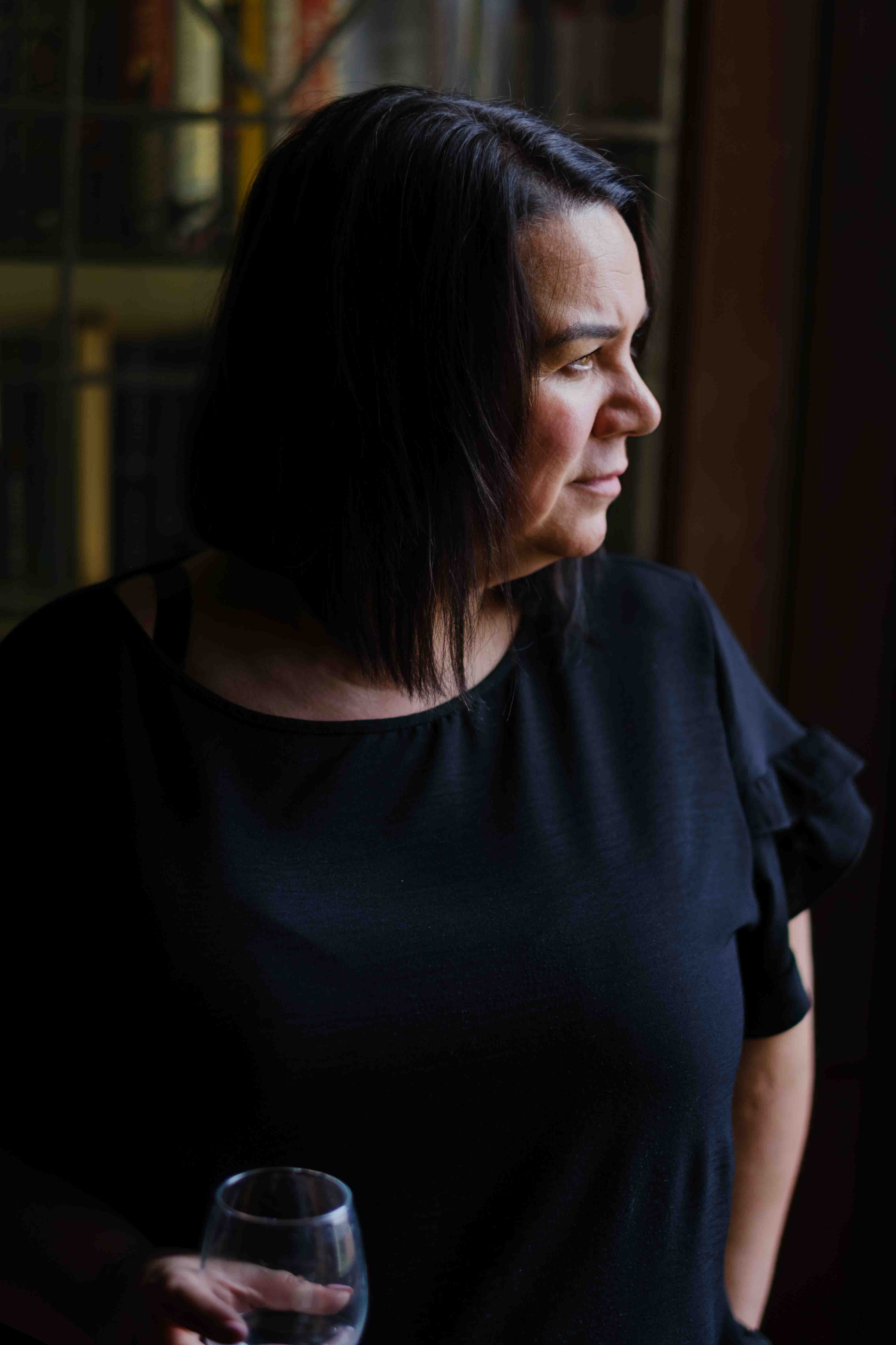 Indoor portrait of a female comedian and social care worker photographed in Glasgow by Victoria Rose Photography