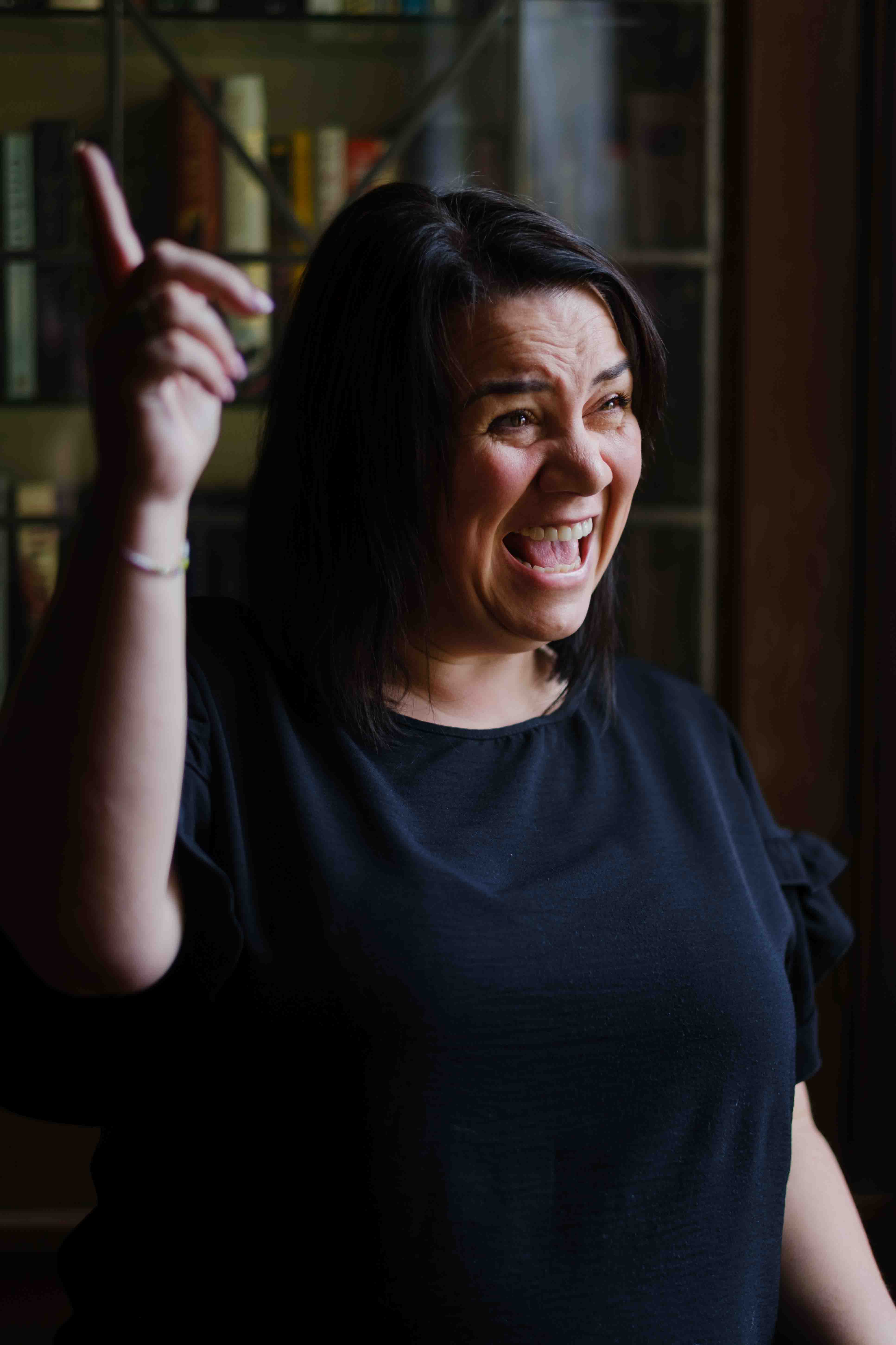 Indoor portrait of a female comedian and social care worker photographed in Glasgow by Victoria Rose Photography
