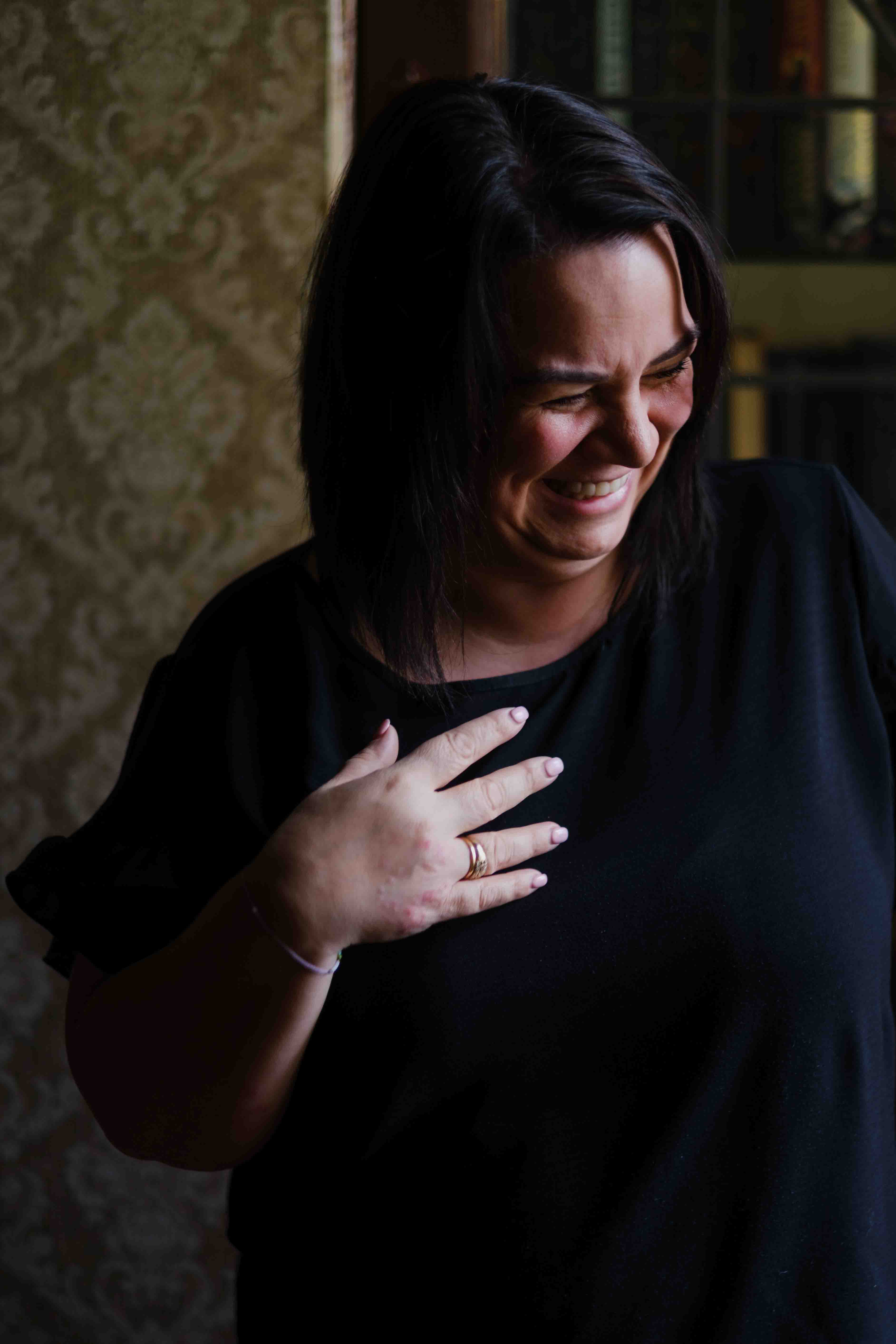 Indoor portrait of a female comedian and social care worker photographed in Glasgow by Victoria Rose Photography