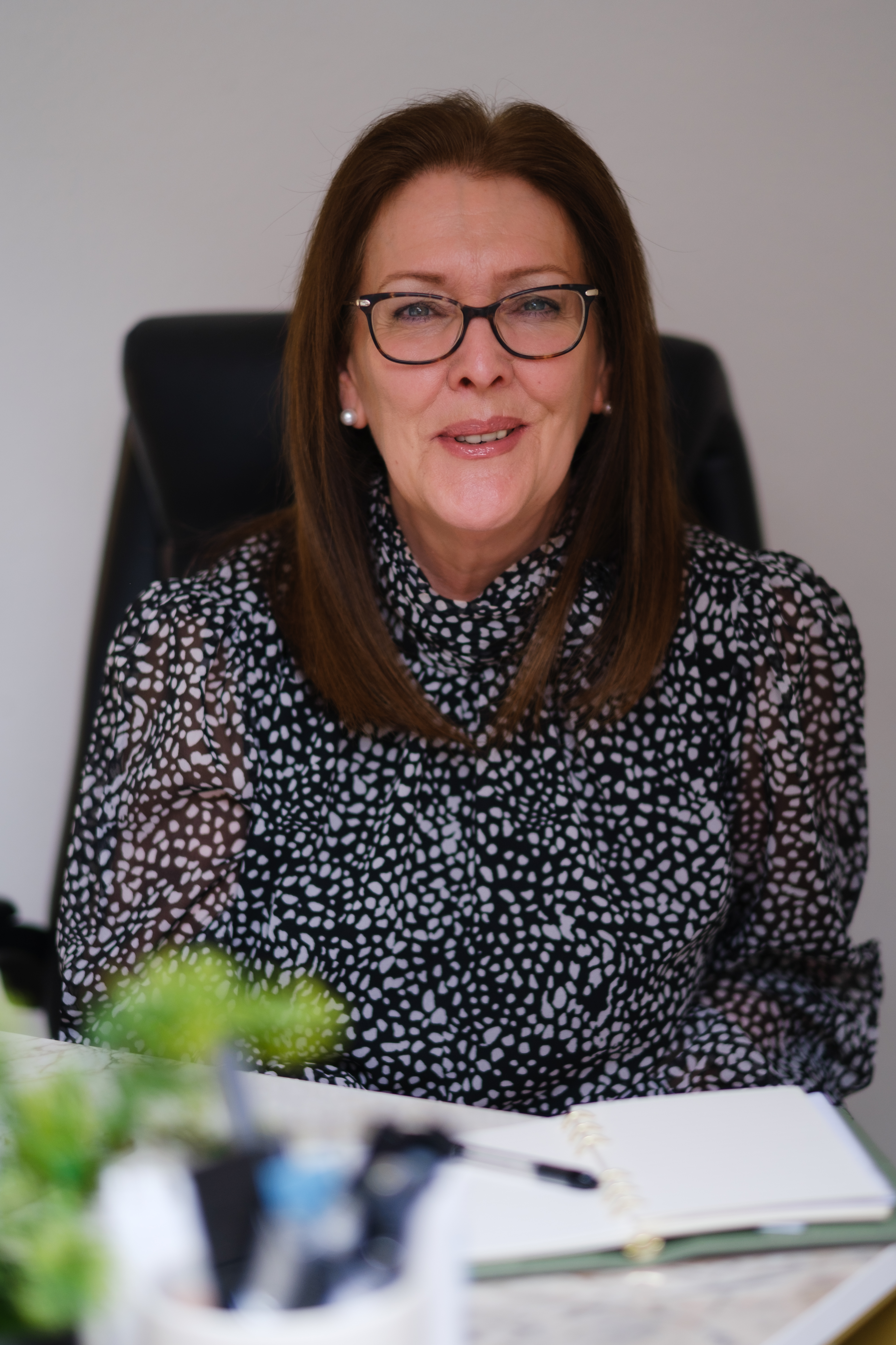Indoor portrait of a female PR consultant photographed in Glasgow by Victoria Rose Photography