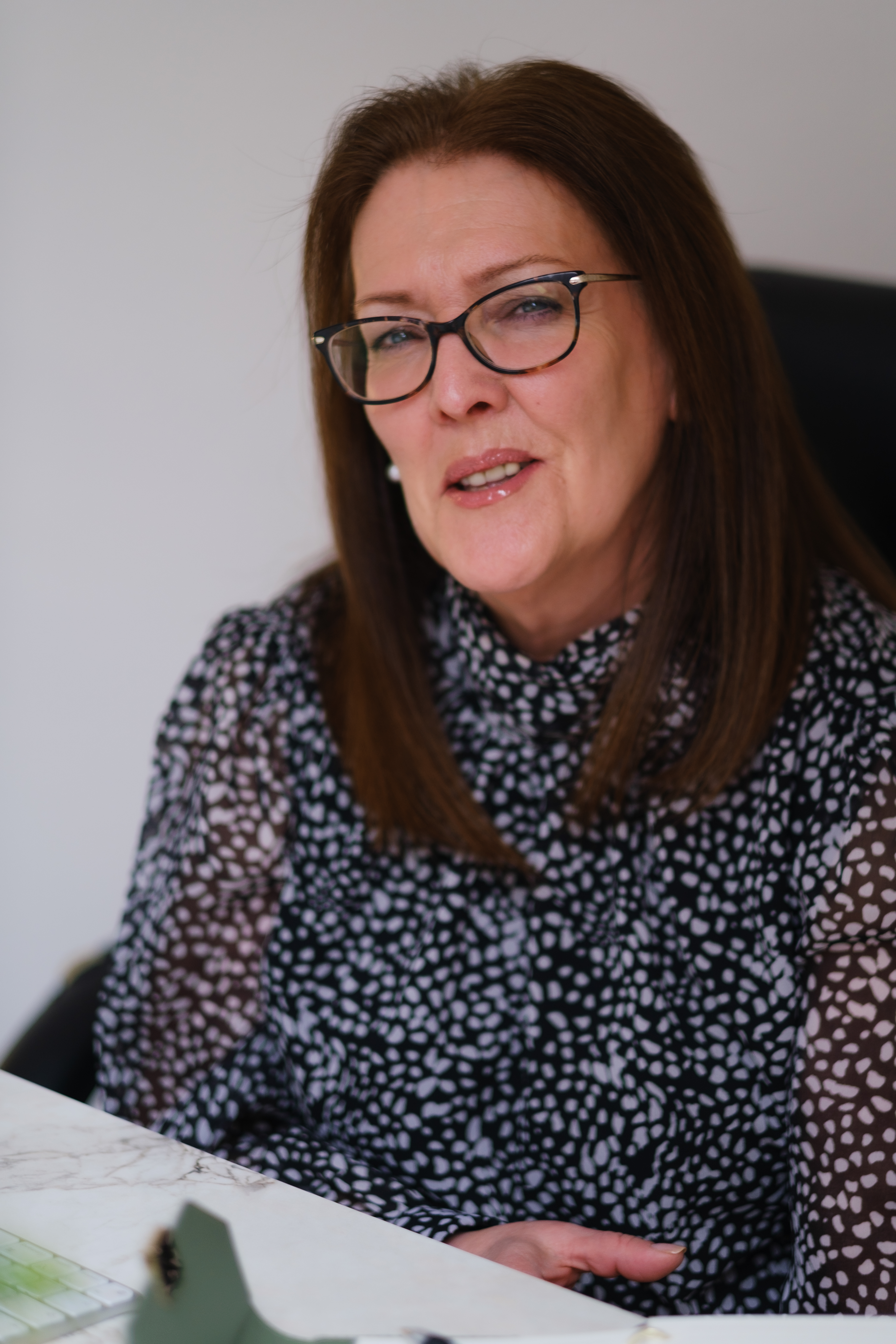 Indoor portrait of a female PR consultant photographed in Glasgow by Victoria Rose Photography
