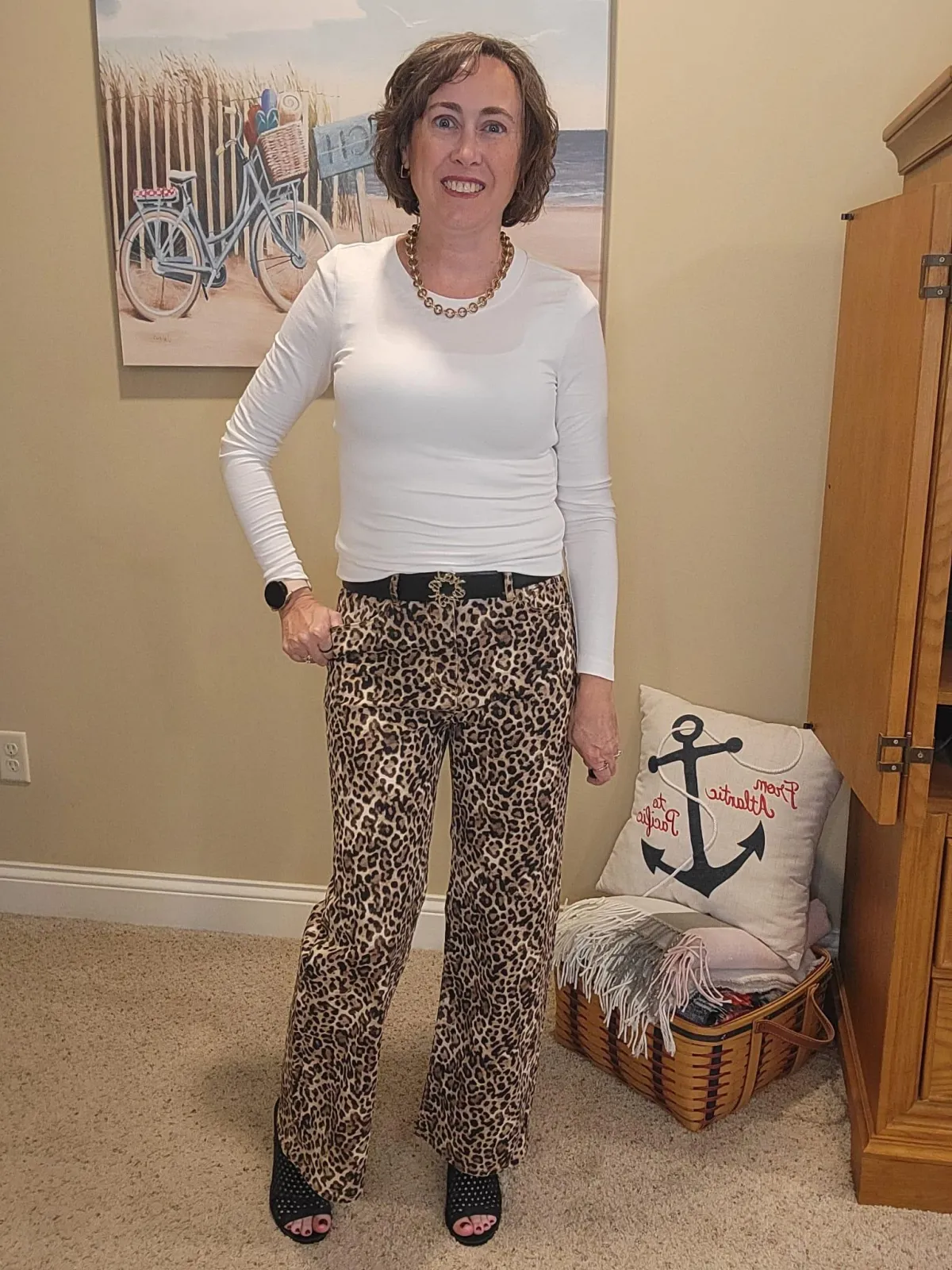 Jenn Whitacre wearing a white long-sleeve Loft tee with Loft leopard print jeans, gold necklace, earrings, black belt, and black heeled sandals — classic fall outfit inspiration by Styled by Jenn.