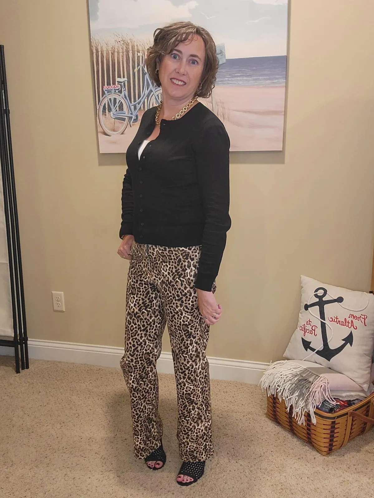 Jenn Whitacre wearing Loft black cardigan and WHBM Forme’ cami with Loft leopard print jeans, gold necklace, earrings, and black heeled sandals — chic fall outfit inspiration by Styled by Jenn.