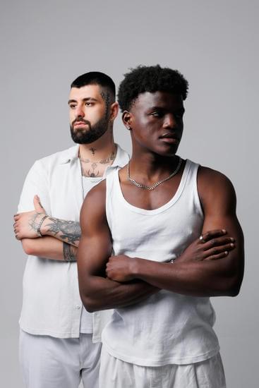 a close up of a person's back with brown spots