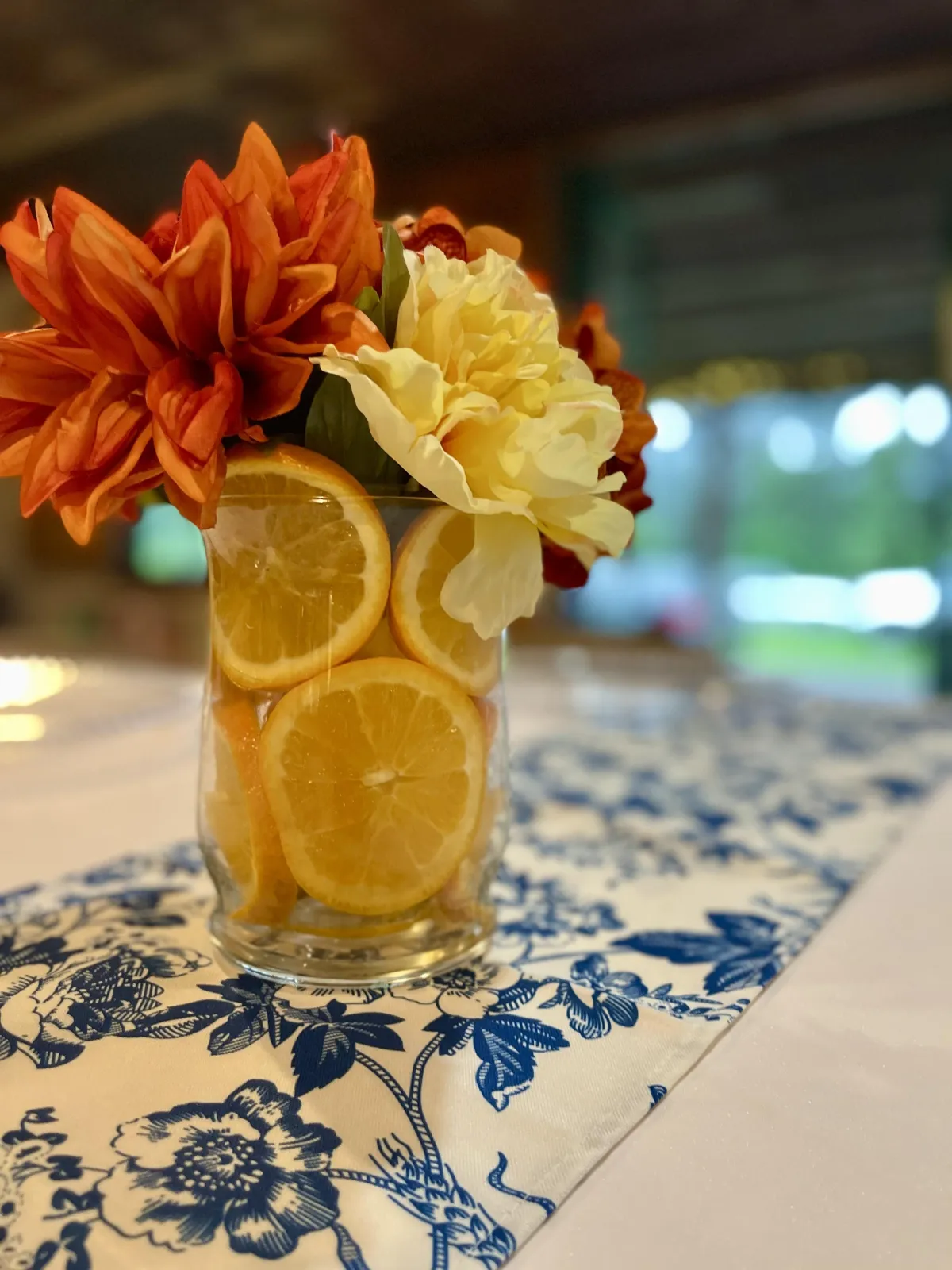 Corporate celebration designed by Curated Experiences by Ashley Gallon, featuring custom floral arrangements