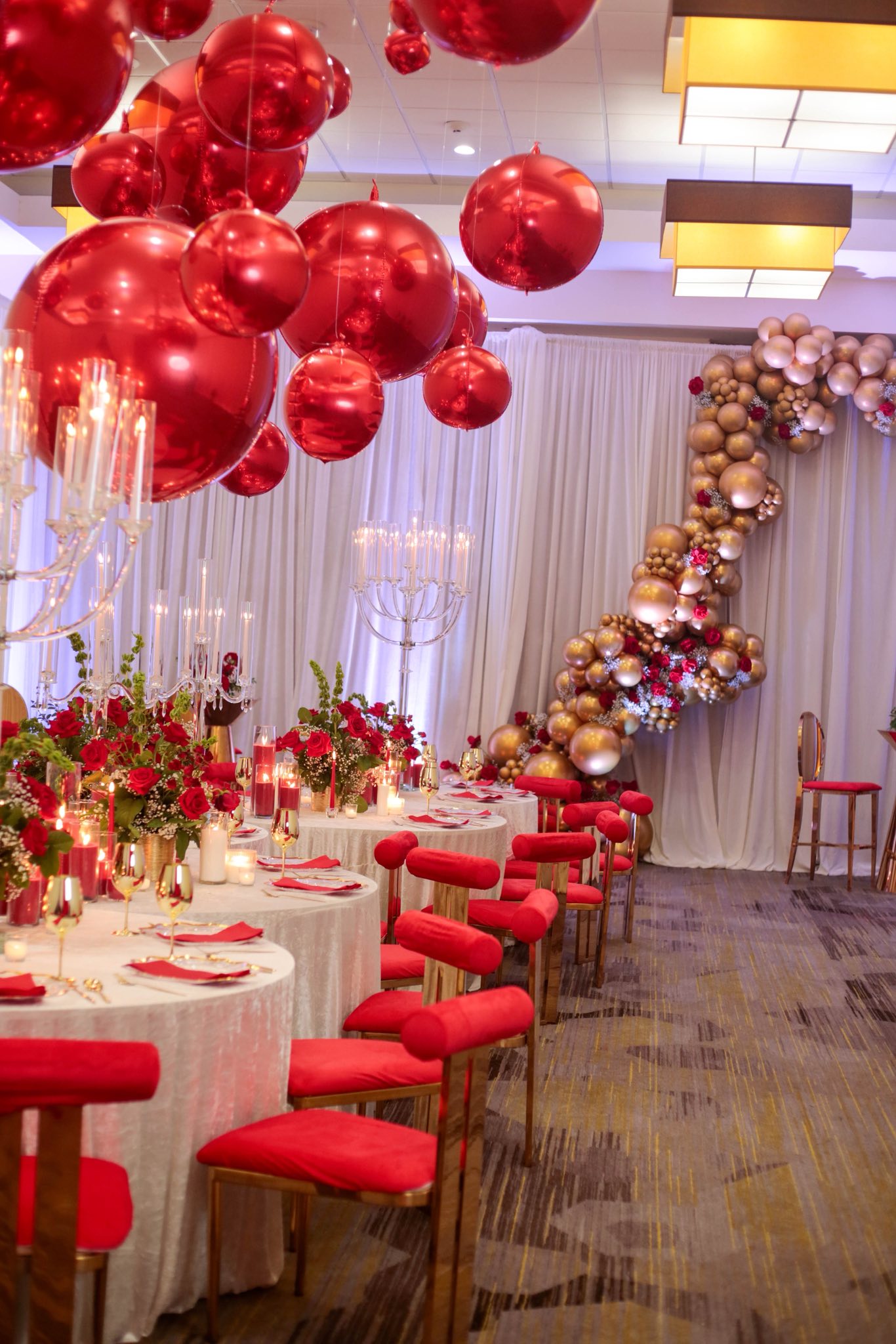 Curated Experiences balloon arch installation with organic structure and luxury color palette, East Texas
