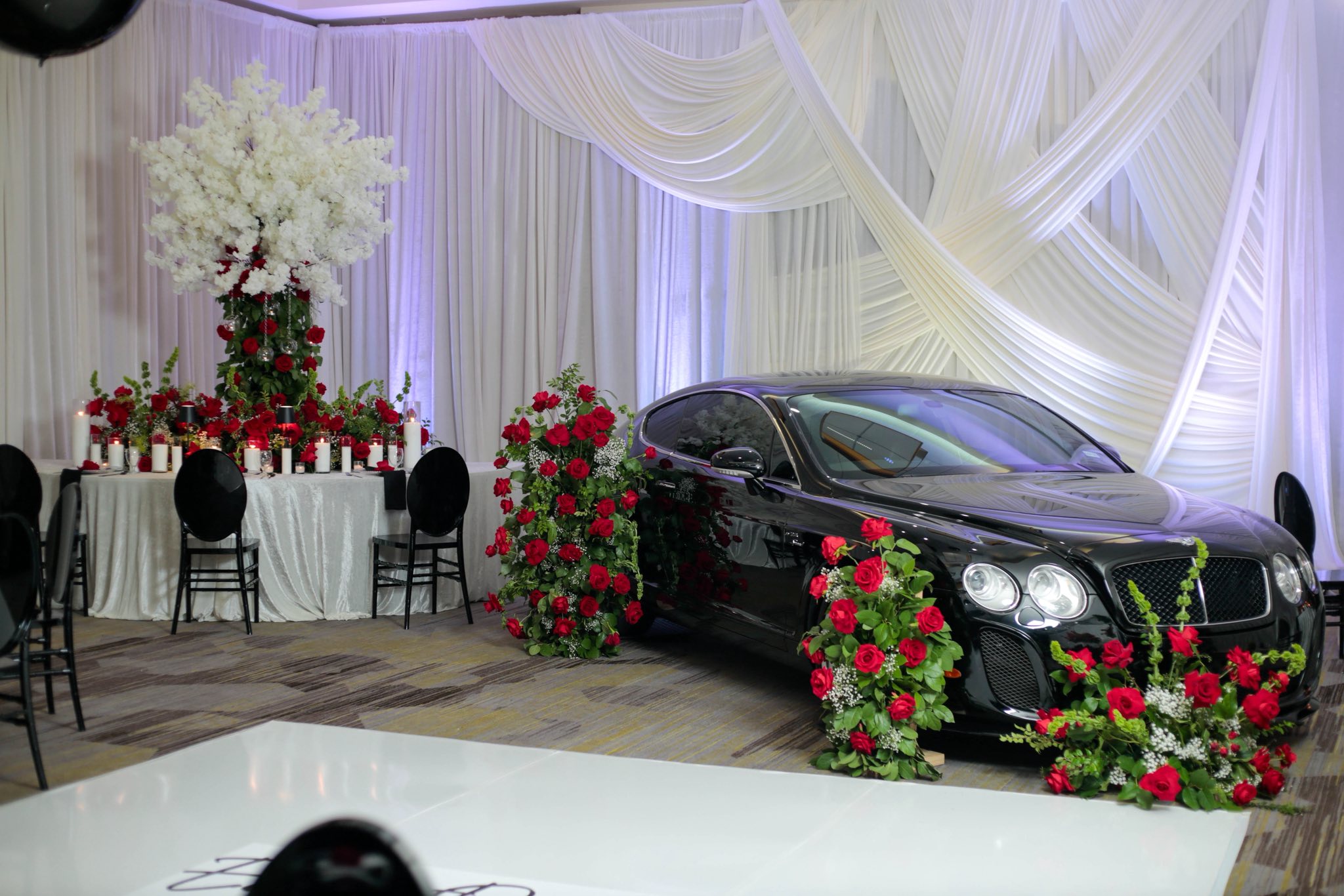 Structural event design by Curated Experiences by Ashley Gallon, featuring a luxury backdrop installation.