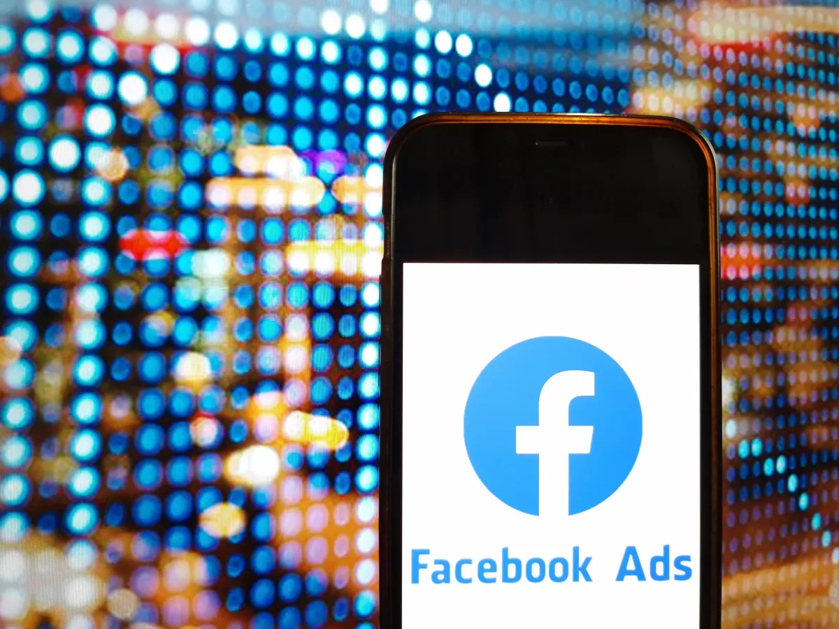 Cell phone showing the Facebook Ads logo