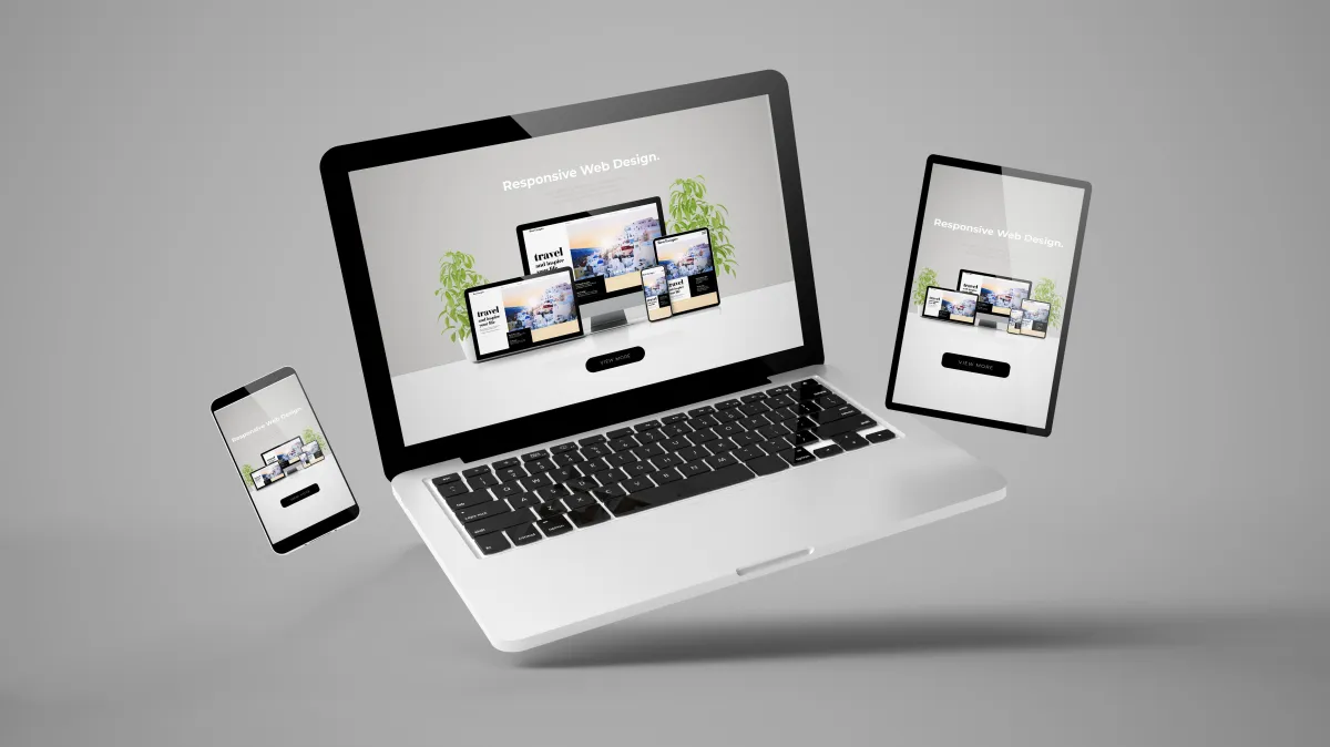 Picture of a Laptop, Tablet and cellphone, showing a picture of the same website on all 3 devises