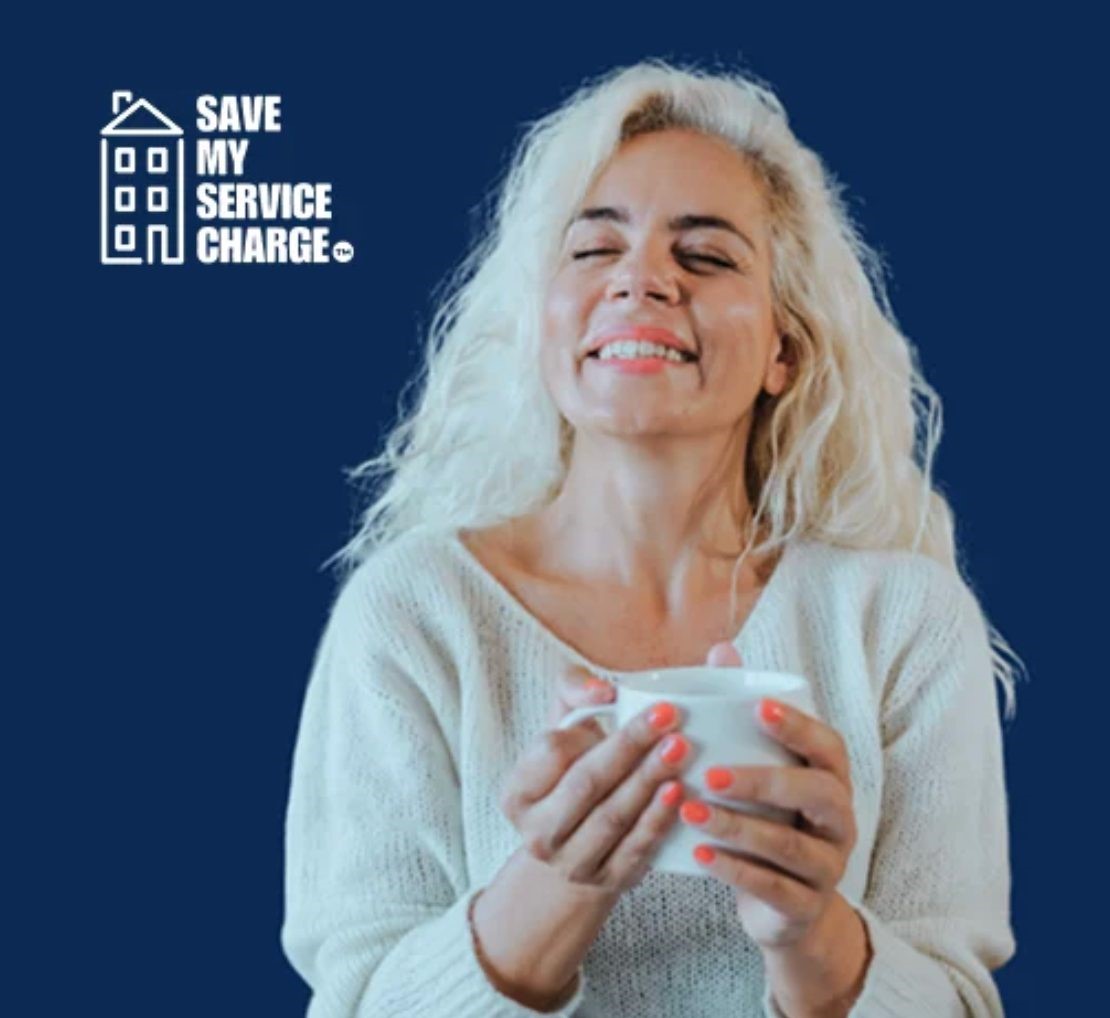Awoman happy after saving money on her leasehold service charge