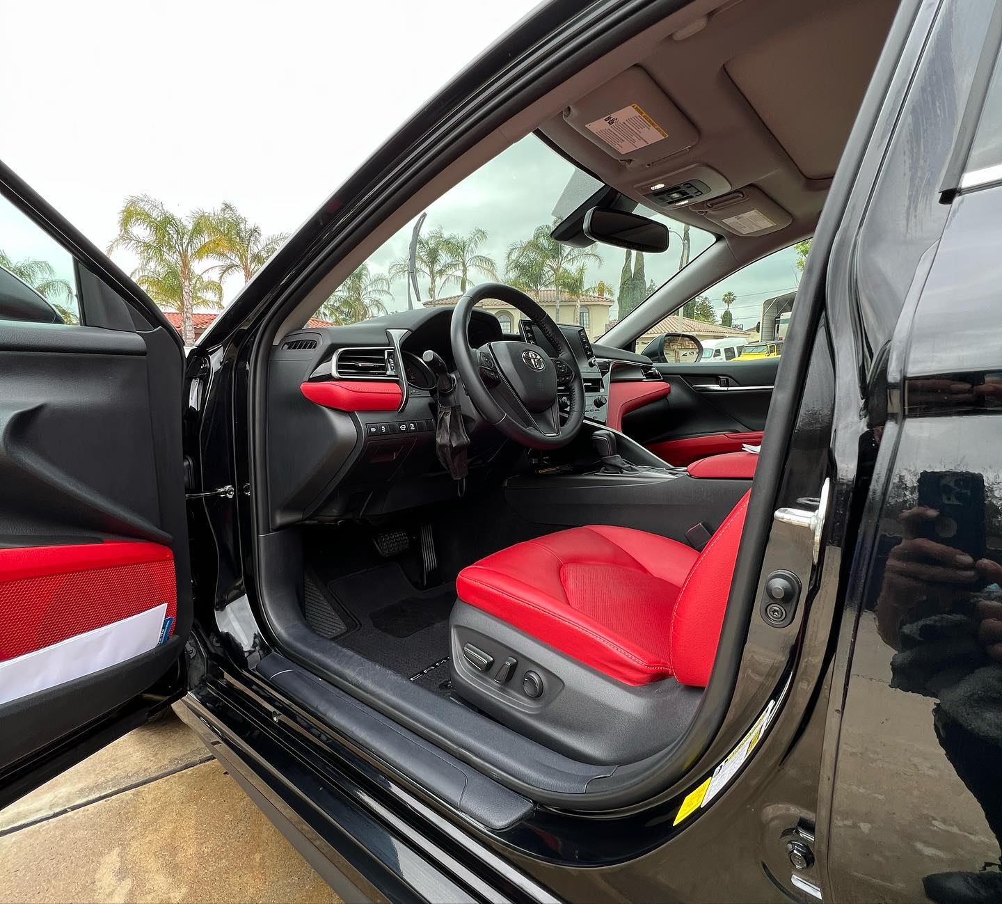 Obsidian finish mirror reflection on dark metallic paint