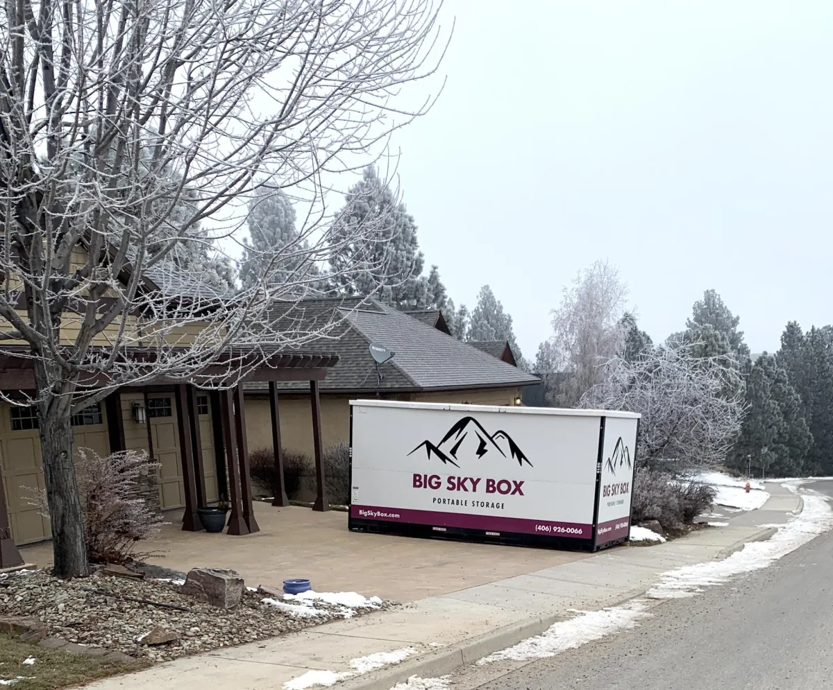 image of a 16 foot big sky box portable storage in Kalispell container in a driveway of a home