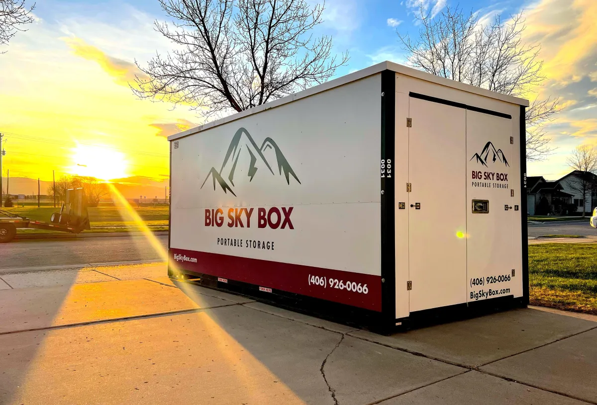 image of a big sky box in the driveway offering portable storage in stevensille