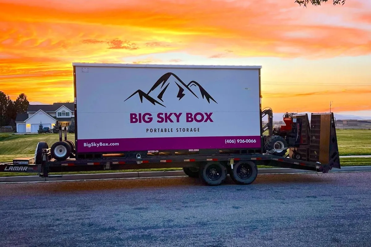 Big Sky Box portable storage container on a trailer at sunset in Montana
