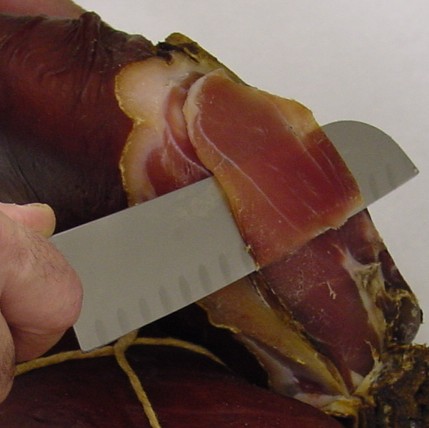 Blackstrap ham being sliced by Chef Zak Kuczynski Corporate Executive Chef in Wisconsin
