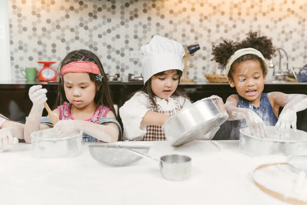 Kids baking cookies for ChocoFest 2025 Sherwood Park