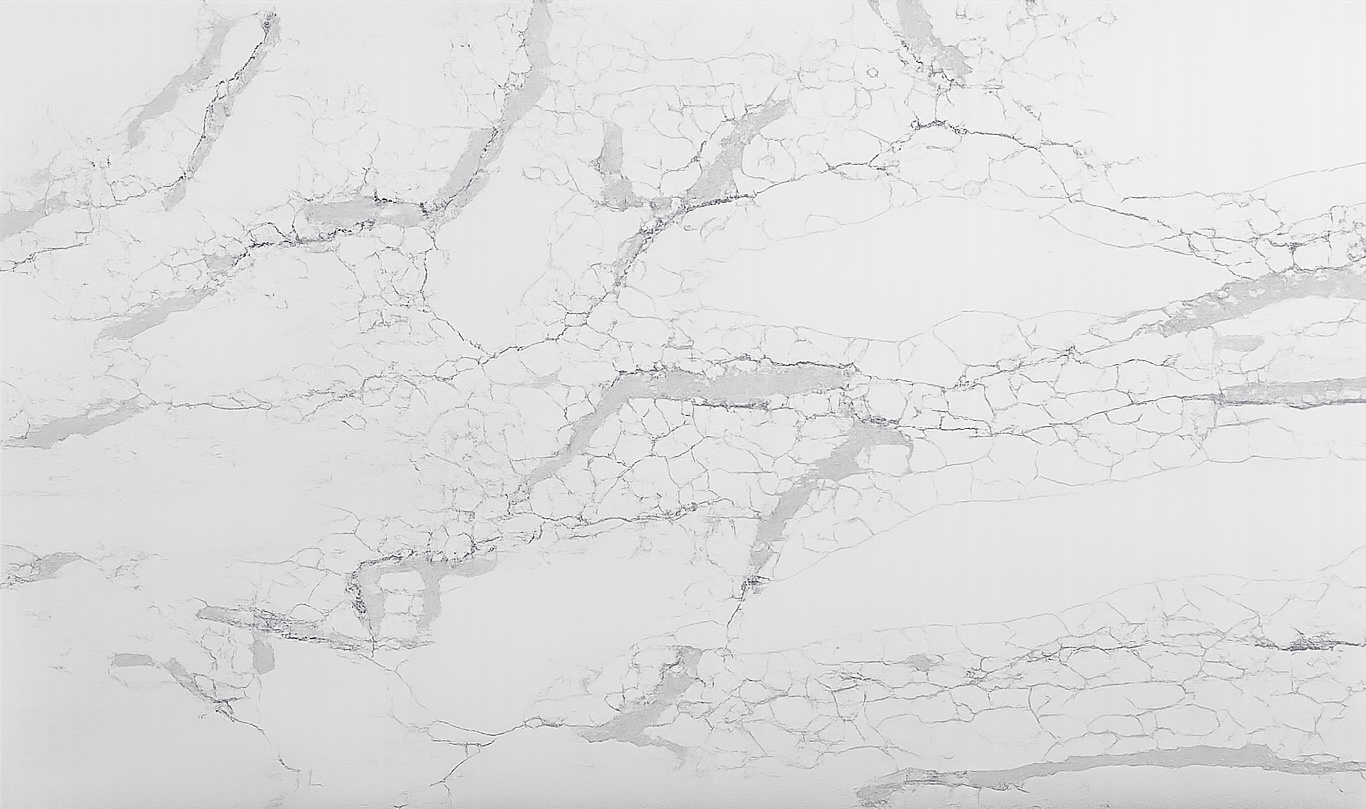 a close up of a white marble surface