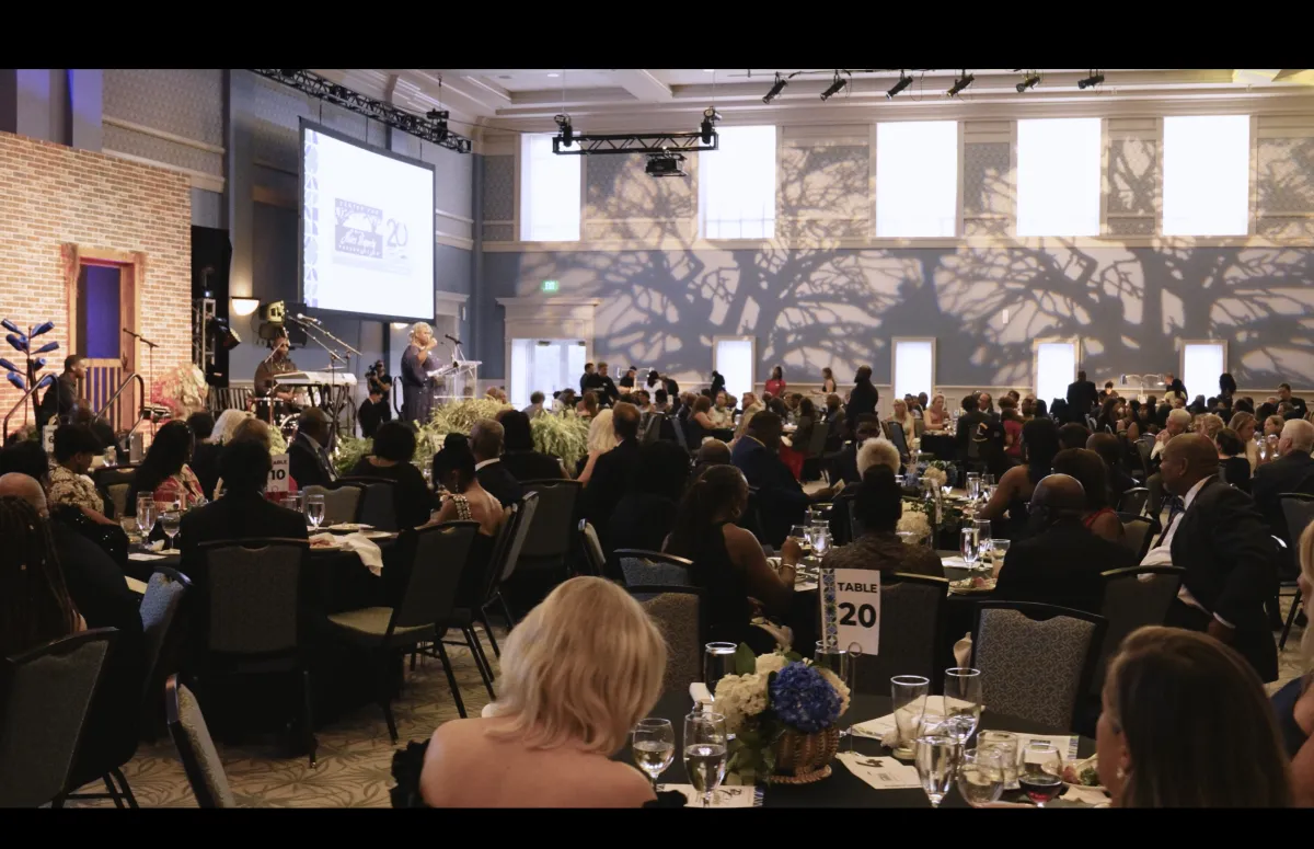 person hand with green and blue paint