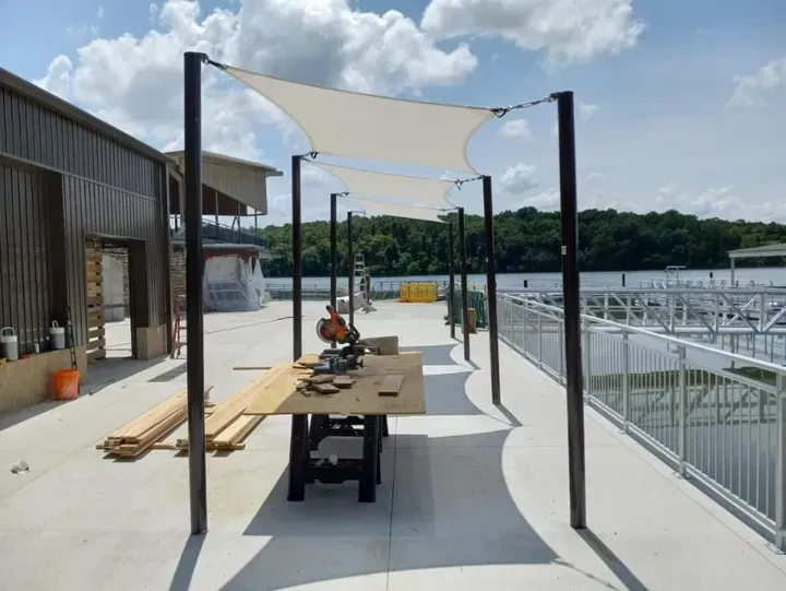 Marina seating designed by Duffer Hollow Designs, to provide shading for outdoor eating area.