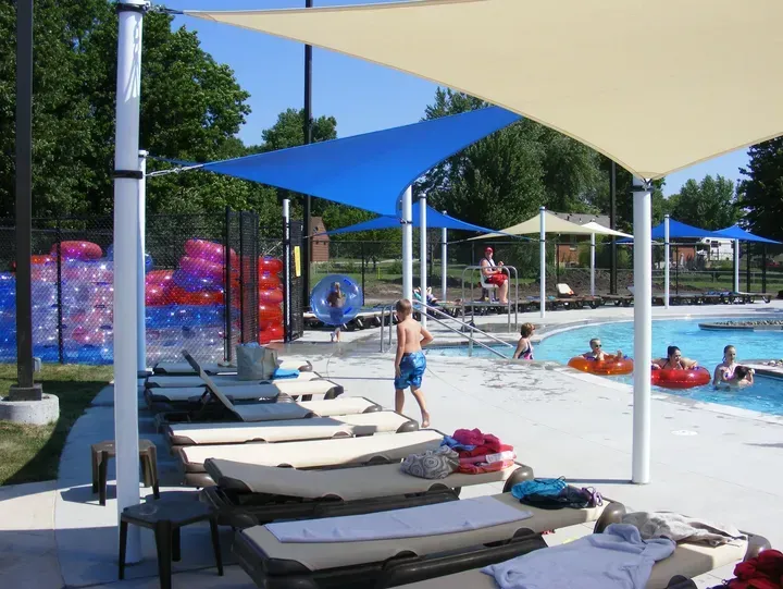 Pool Side shading covering a seated area.