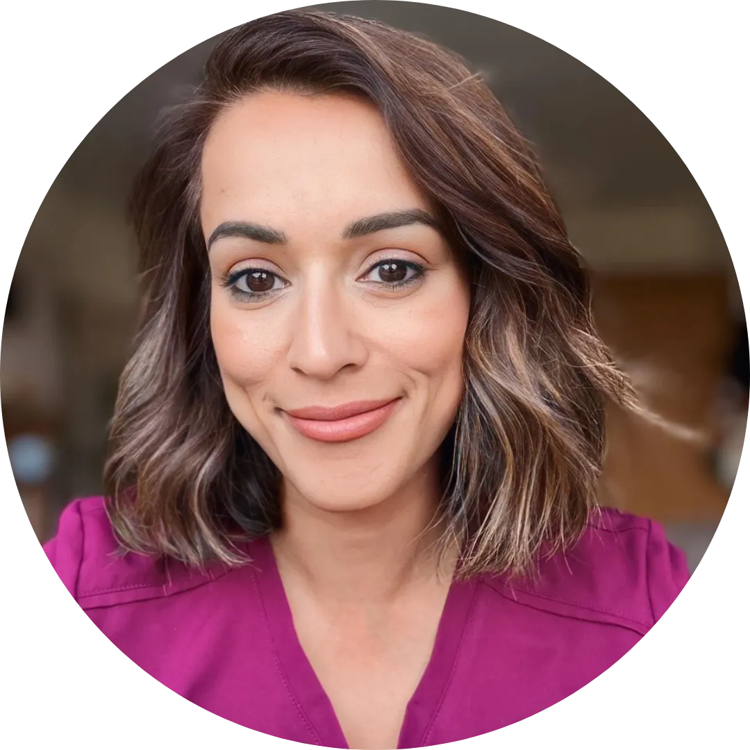 a yellow race car driving down a race track