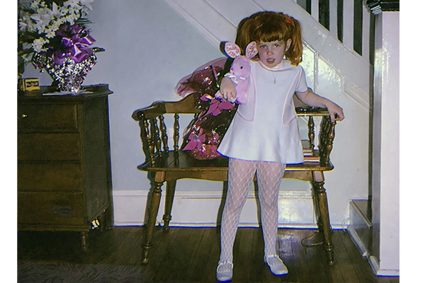 Young girl with stuffed rabbit