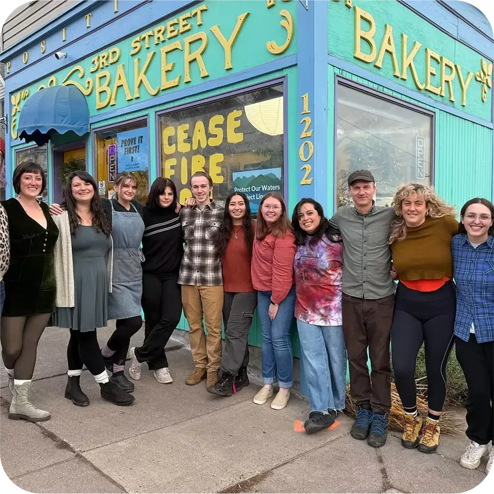 Team of employees celebrating becoming business owners