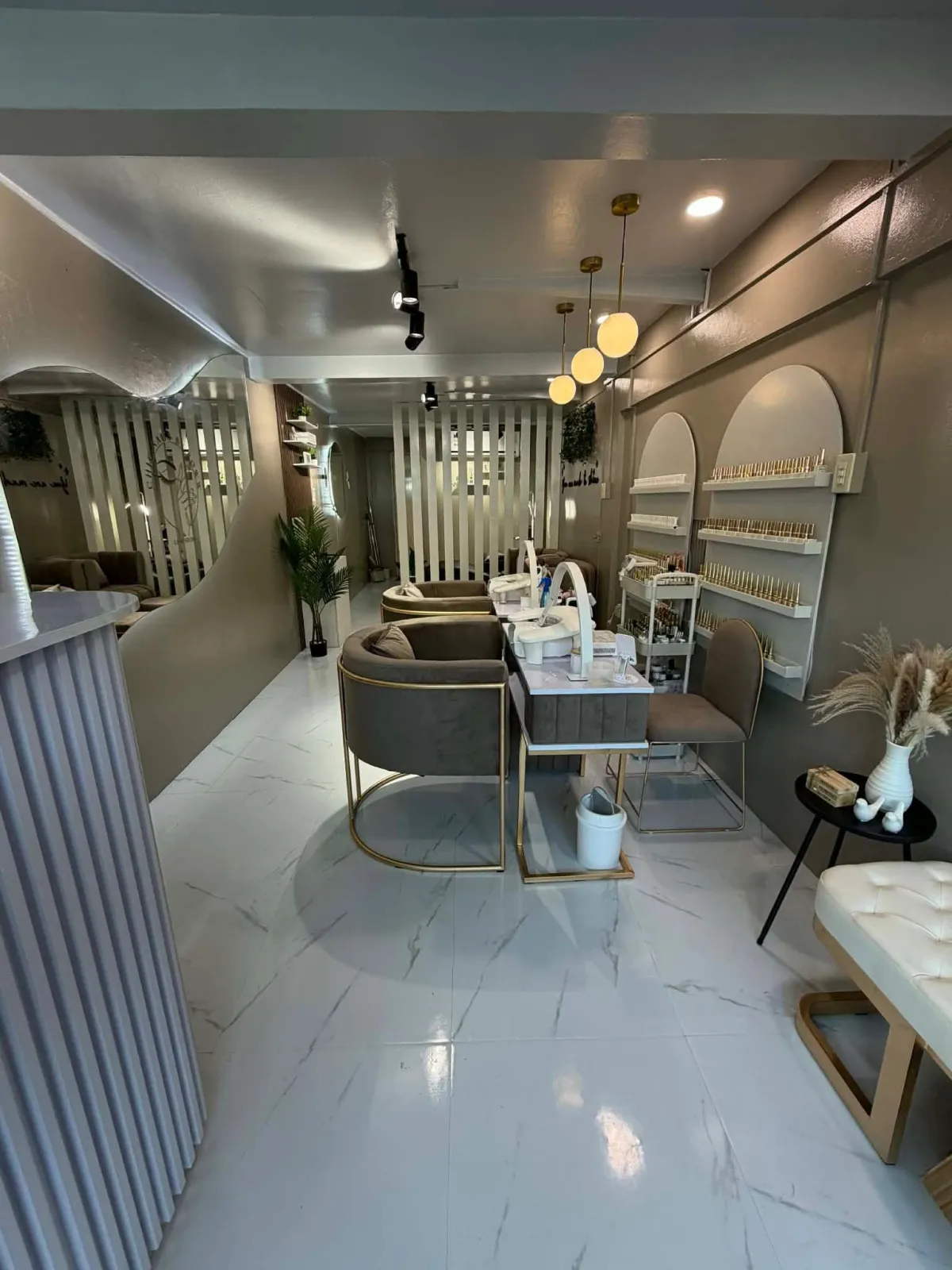 a hair salon with chairs and neon signs