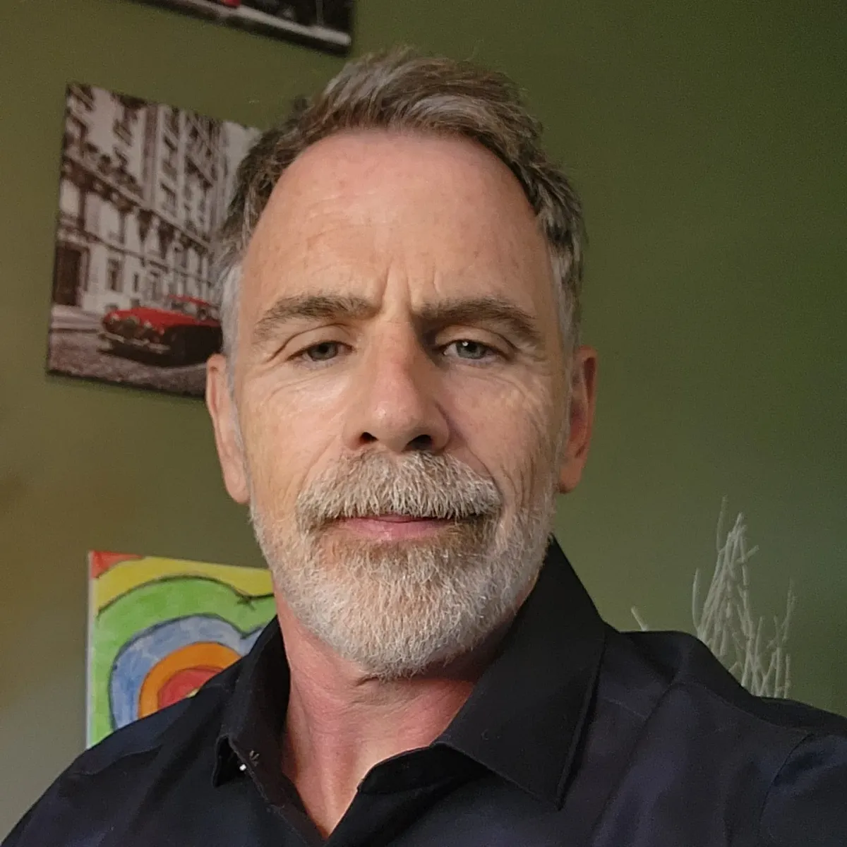 A small boat floating on top of a large body of water