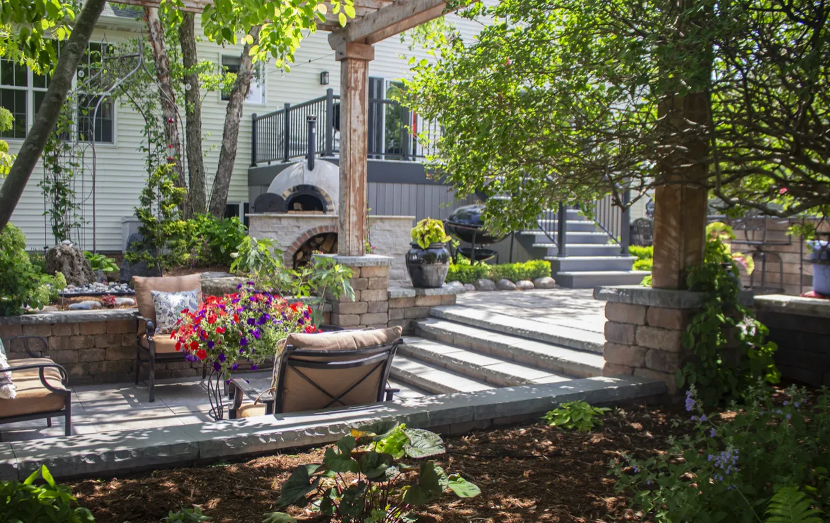 Outdoor kitchens, fire pits, and custom pergolas