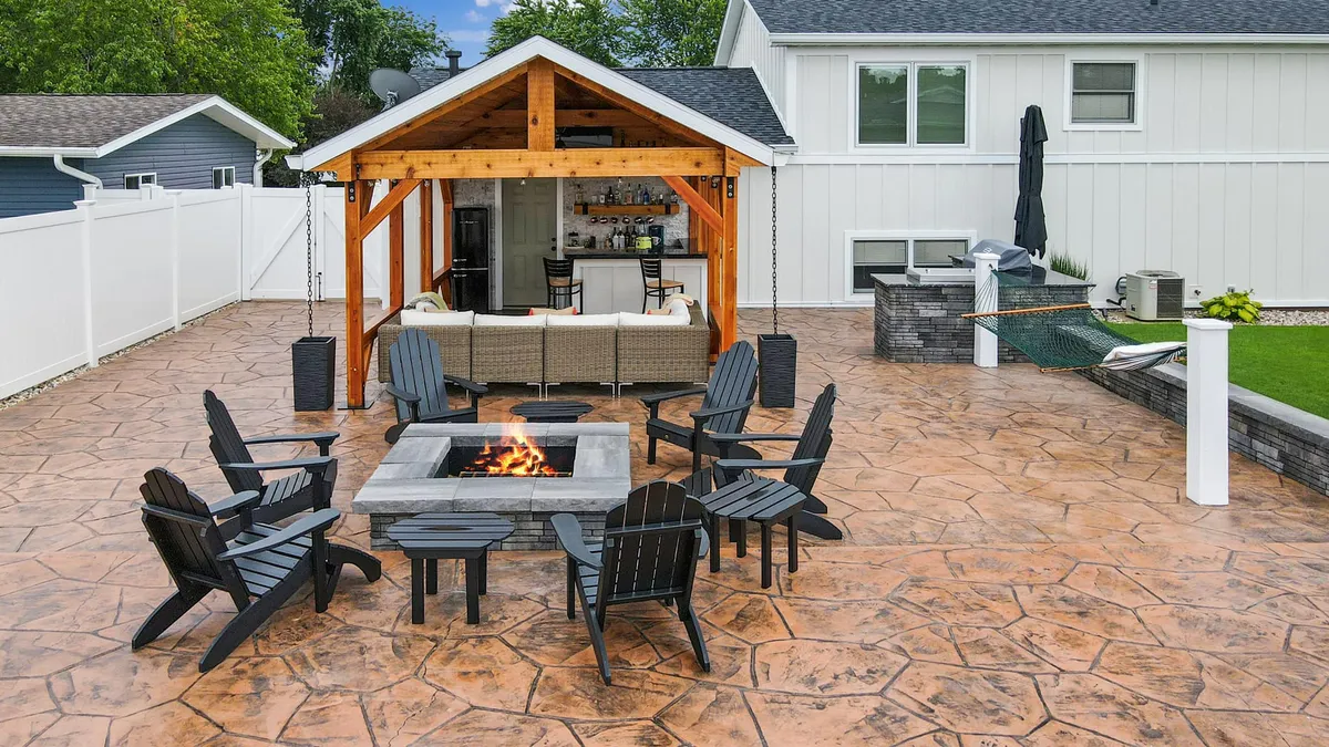 Outdoor kitchens, fire pits, and custom pergolas