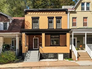 Basement before renovation, dark and unfinished