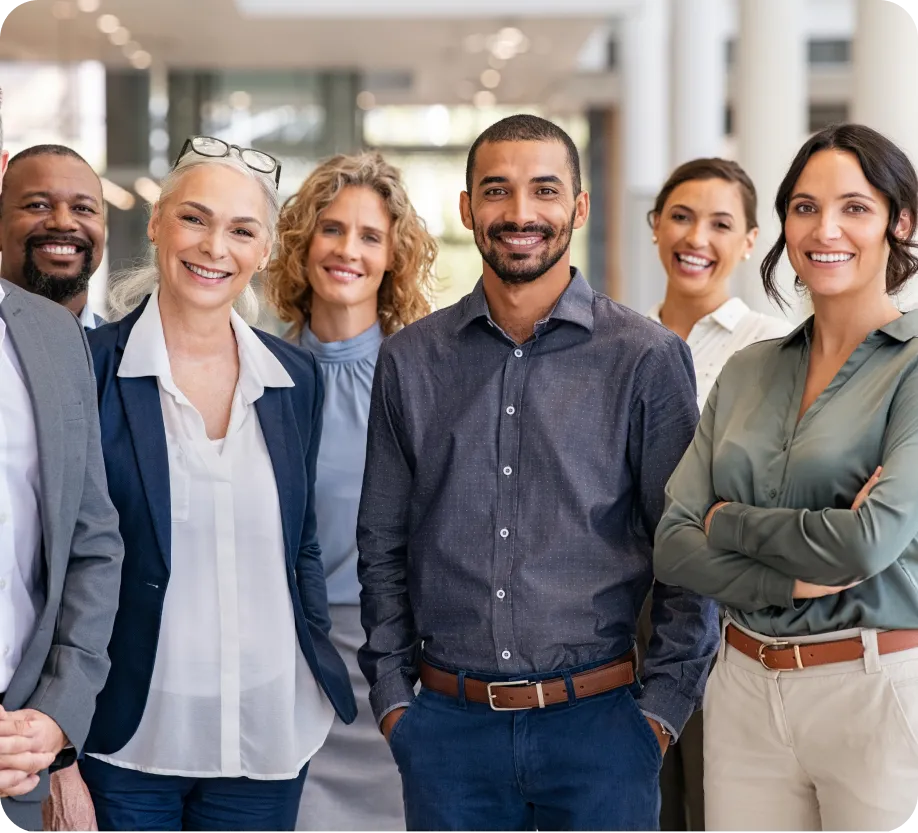 group of workers posing for camera