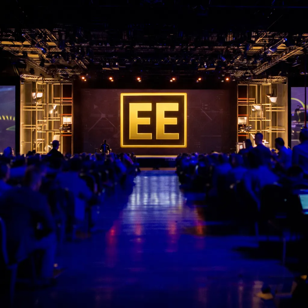 Elijah Edwards corporate stage setup featuring centered show branding before a live event